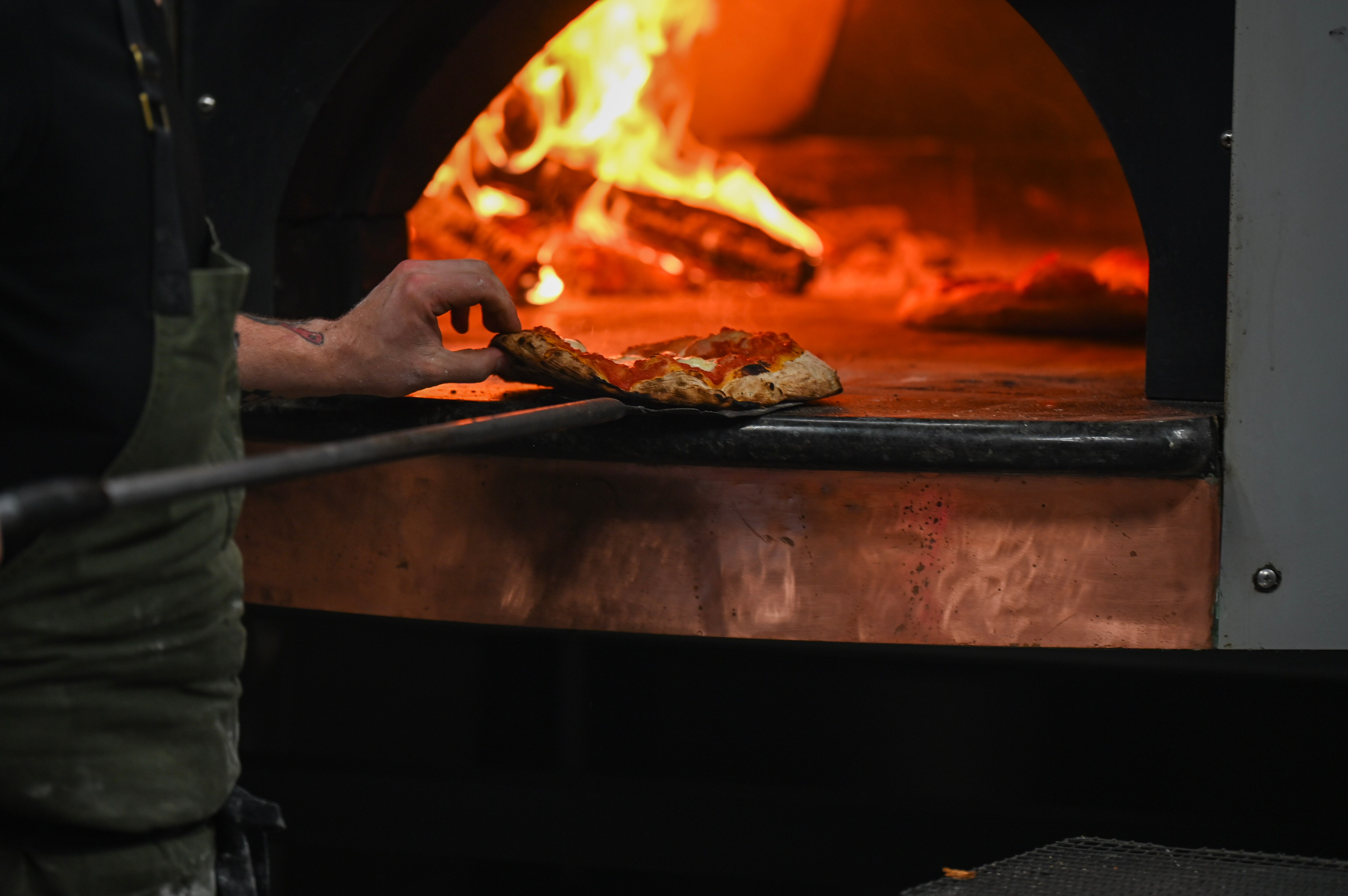 A new Federal Hill restaurant will bring wood-fired pizza to Cross Street.