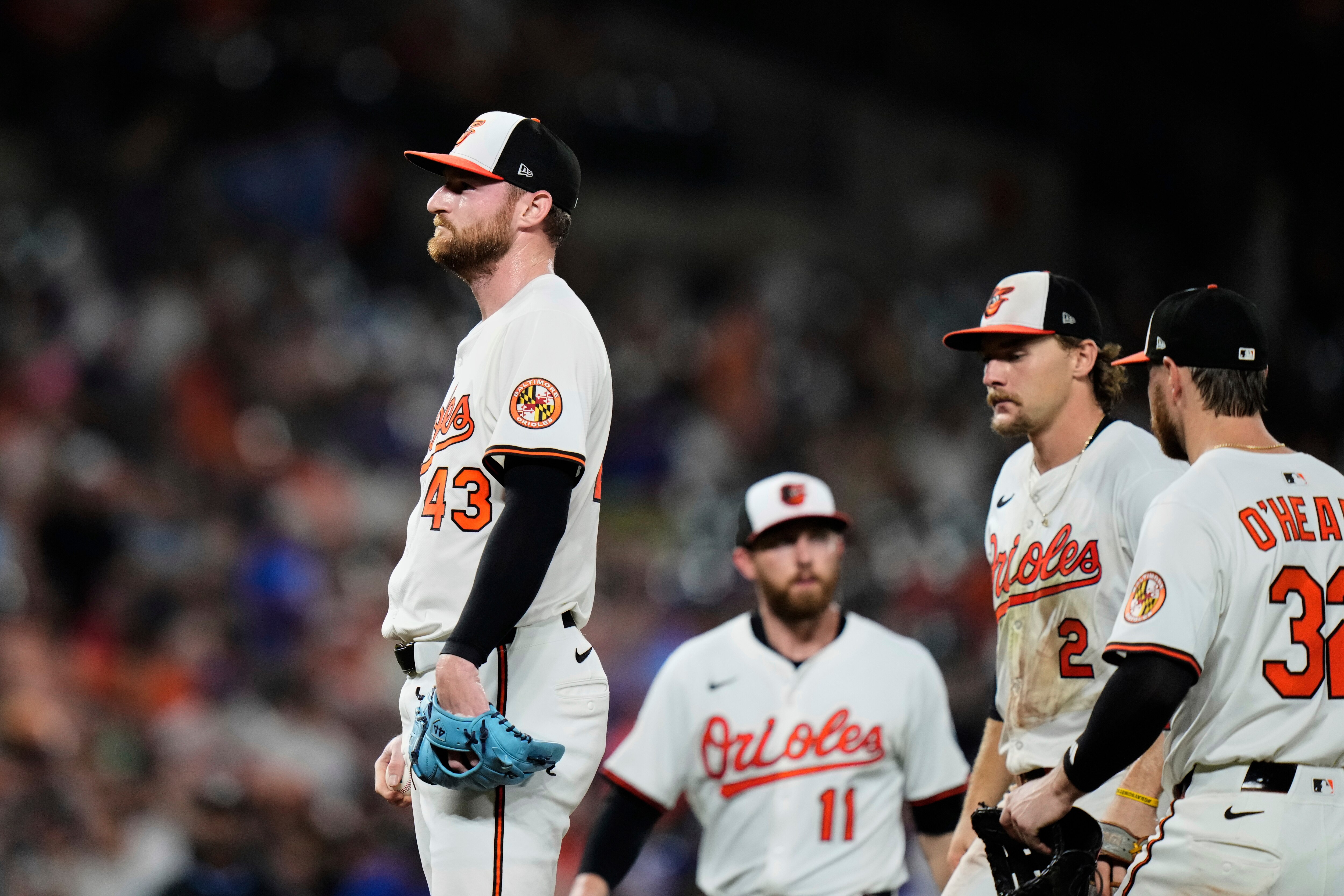 Reliever Bryan Baker (43) leaves the mound after giving up four runs during the eighth inning.