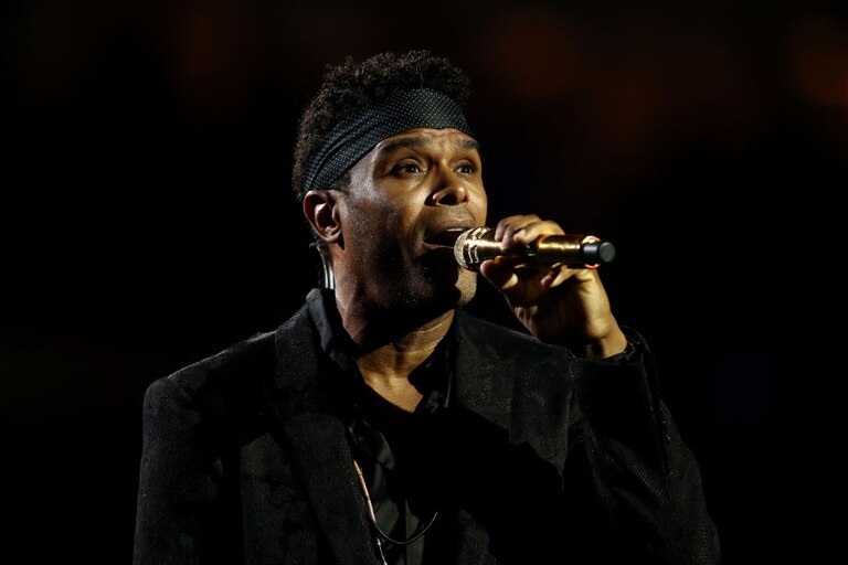 NEW YORK, NY - AUGUST 27: Singer-songwriter Maxwell performs the National Anthem during the opening night ceremony at Arthur Ashe Stadium on Day One of the 2018 US Open at the USTA Billie Jean King National Tennis Center on August 27, 2018 in the Flushing neighborhood of the Queens borough of New York City.