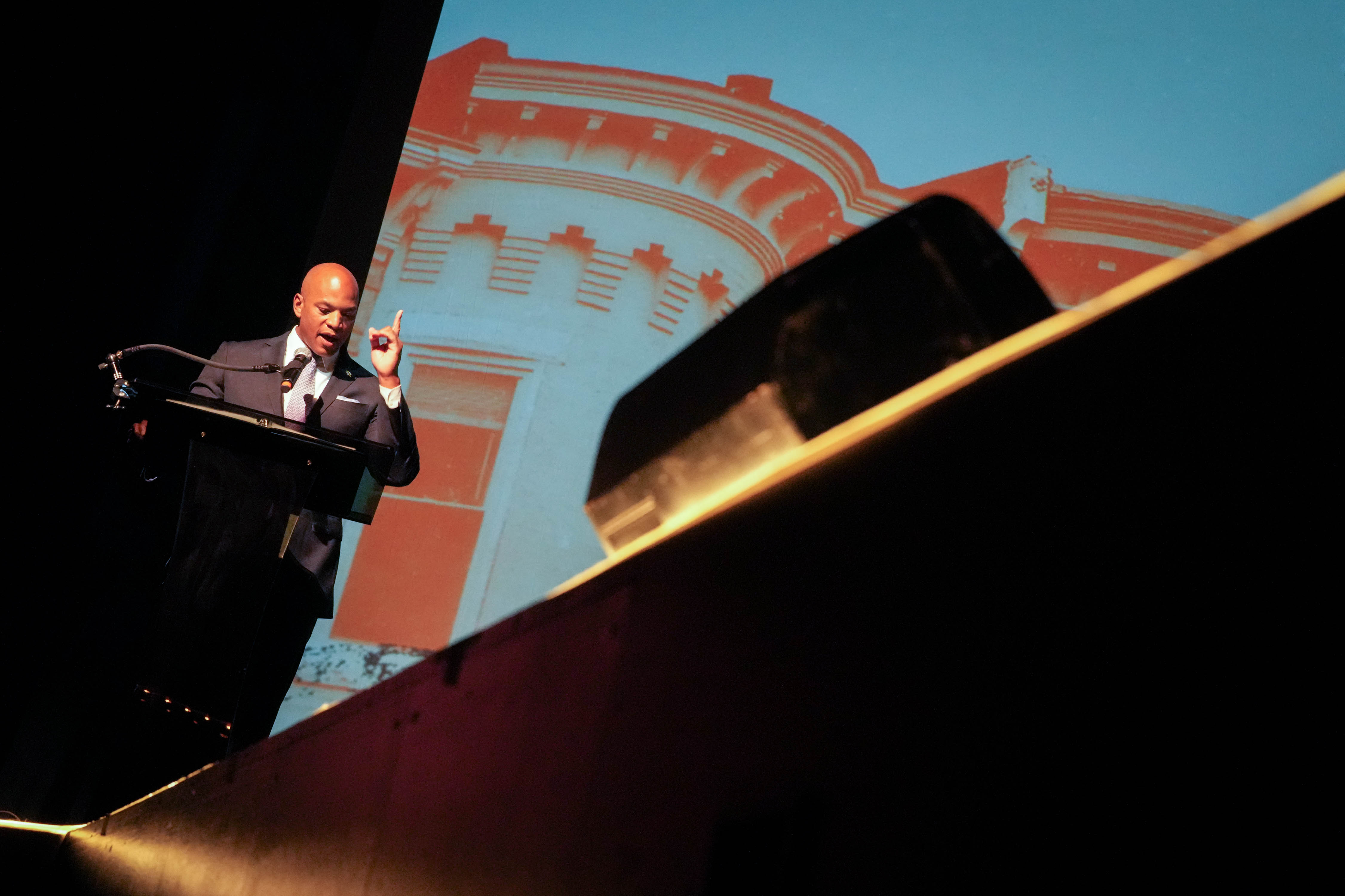 Gov. Wes Moore delivers remarks before Baltimore Mayor Brandon Scott’s annual State of the City Address earlier this year. Moore's executive order bans state employees from using insider information to place bets on predictive market apps.