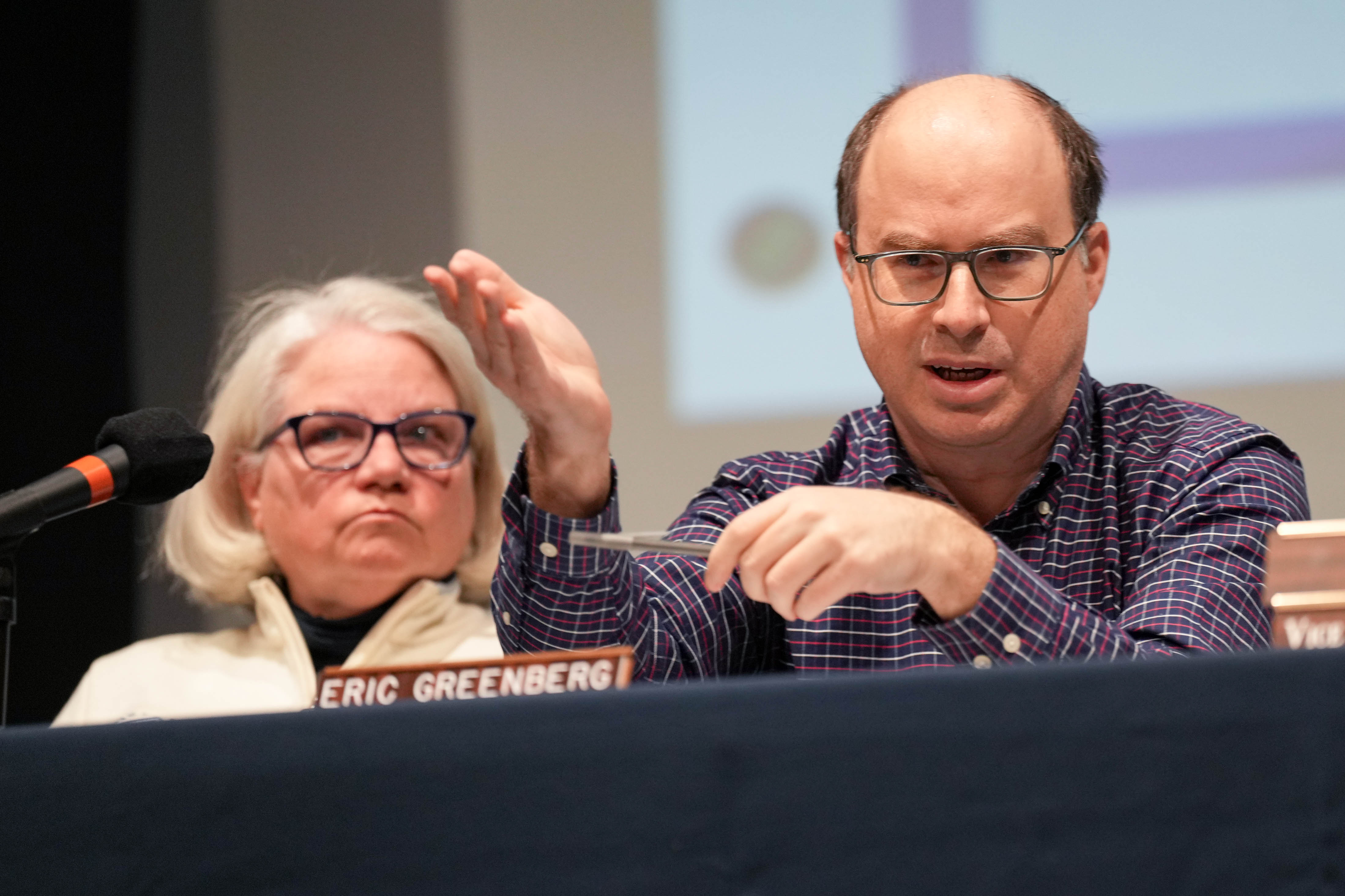 Then-Columbia Association board members Karin Emery and Eric Greenberg attend a town hall this year. They were among three board members removed for alleged ethics violations Thursday evening. 