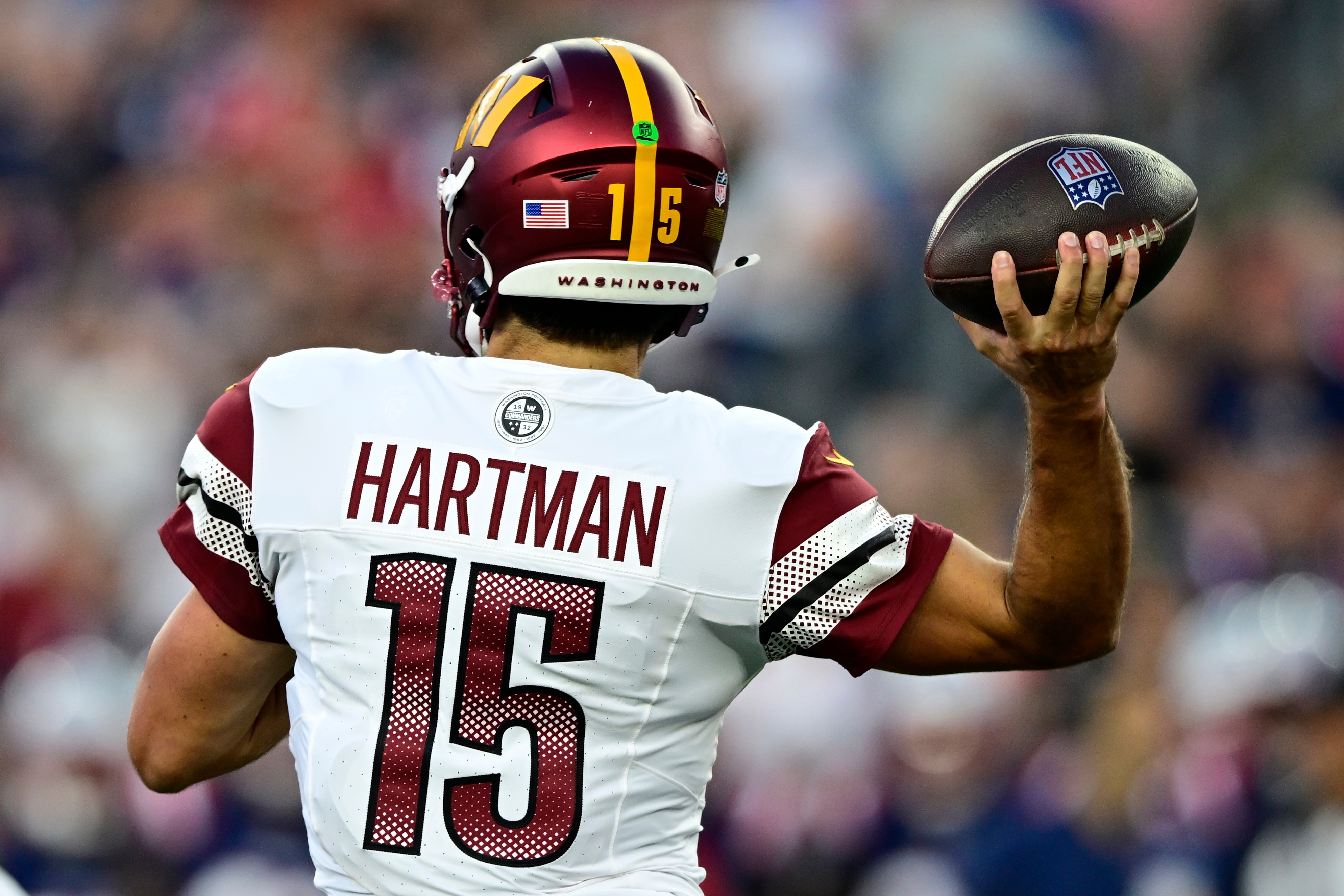 Sam Hartman of the Commanders throws a pass during the first quarter Friday night in a 48-18 preseason loss at New England.