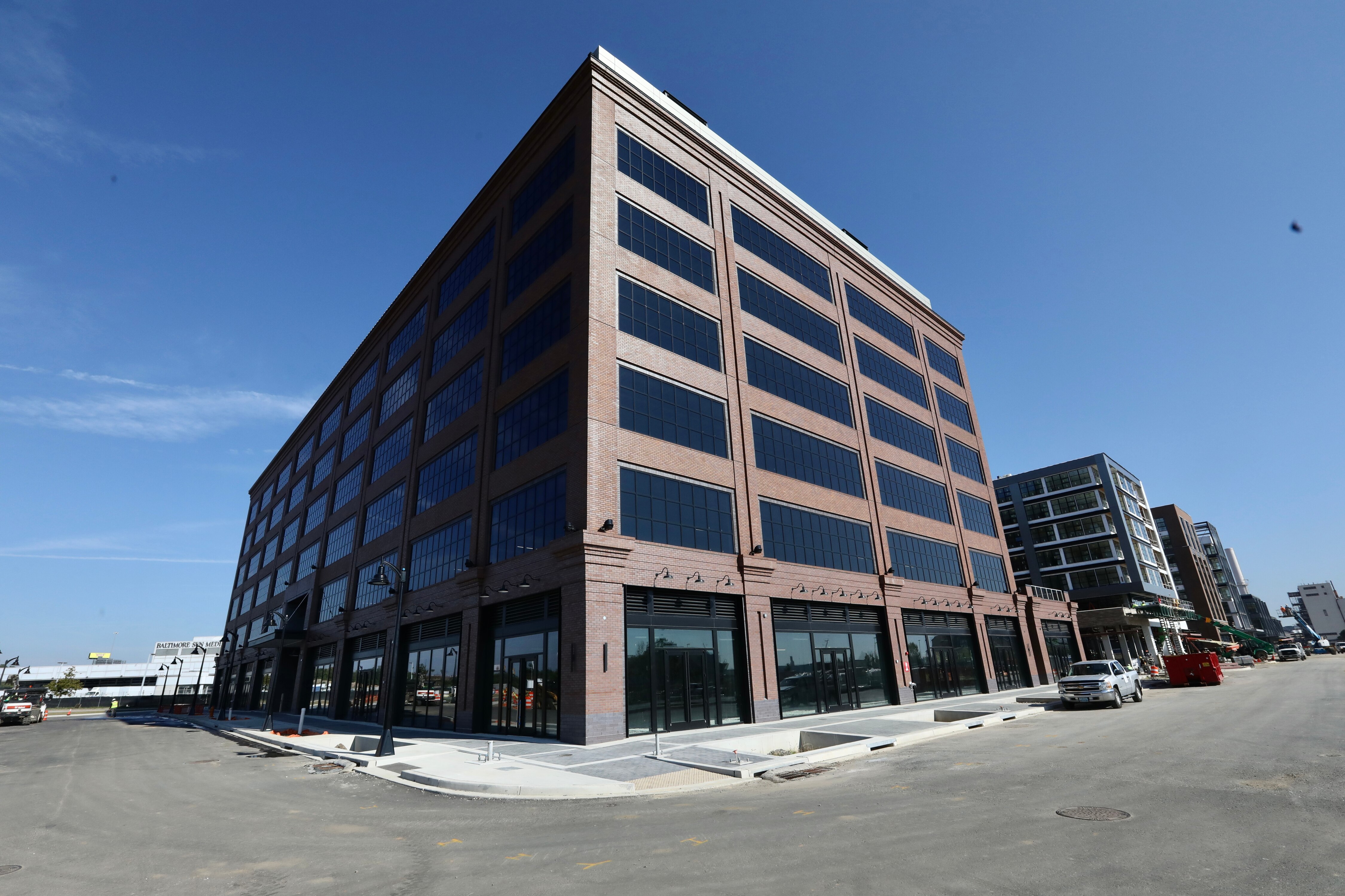 CFG Bank’s new office in the Baltimore Peninsula is full of amenities that aim to draw employees back to the workplace, including a café-style lounge complete with a sports simulator, billiard table and shuffleboard.