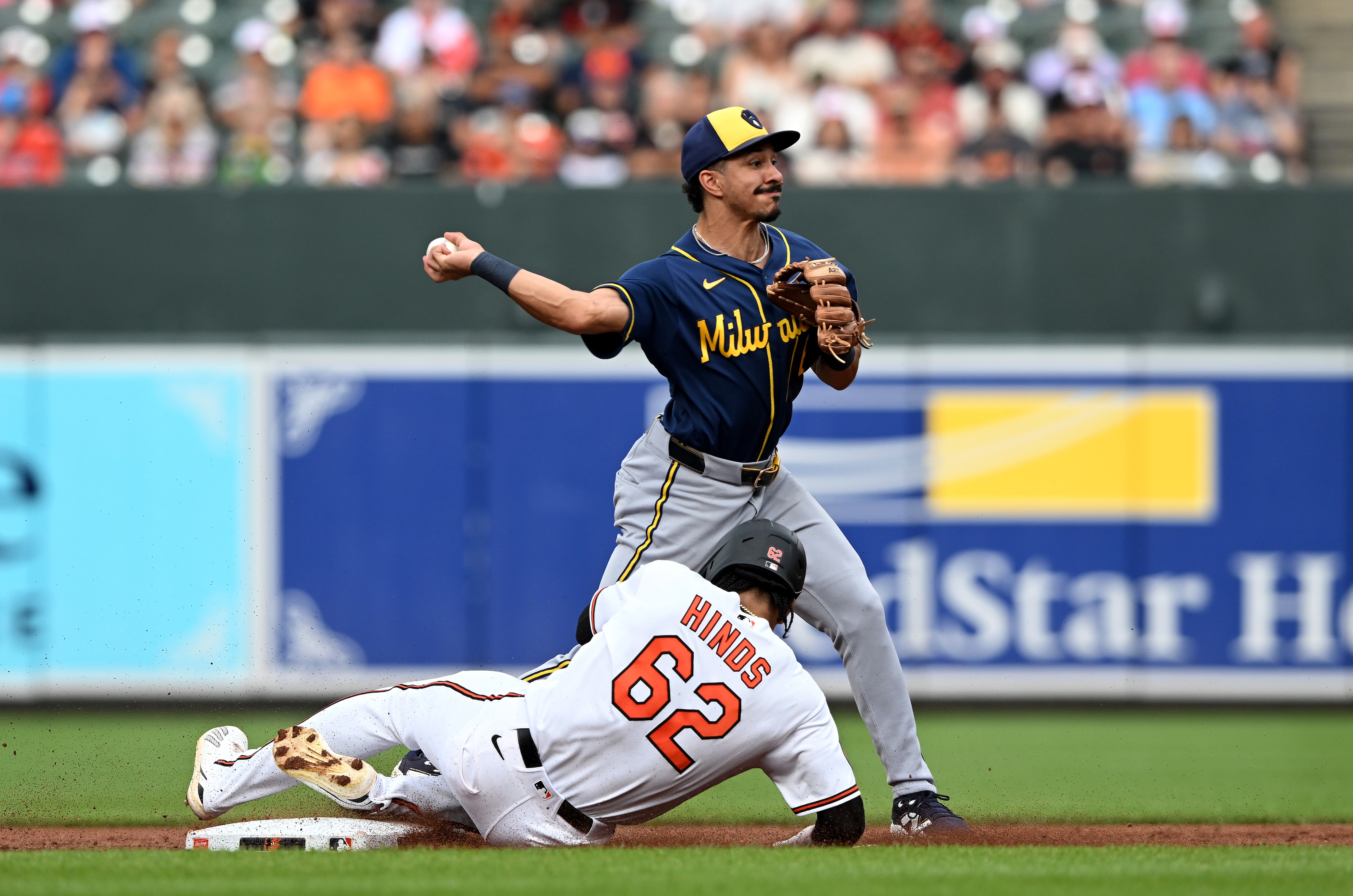 David Hamilton of the Brewers forces out Rece Hinds to start a double play in the second inning Saturday at Camden Yards.