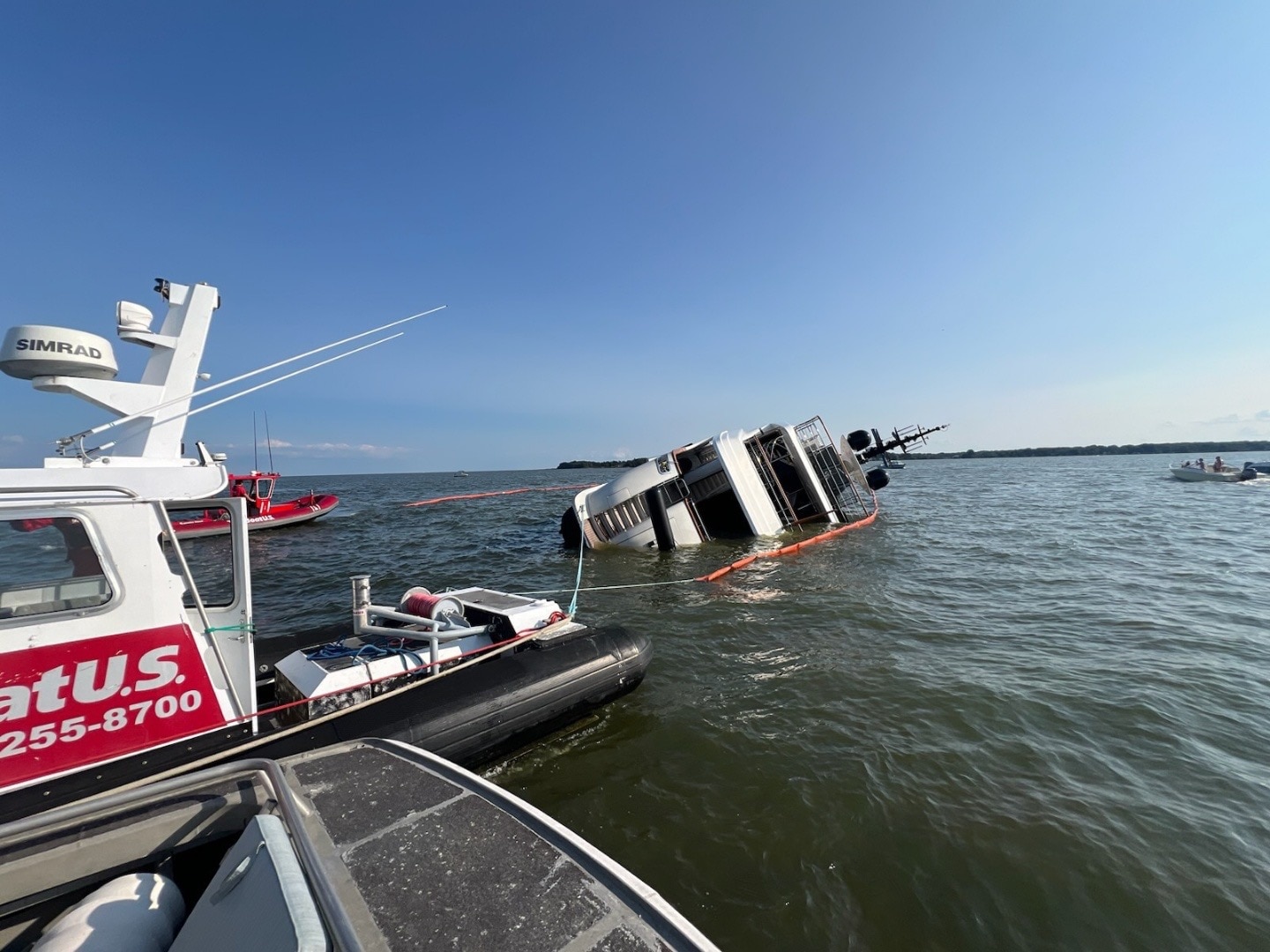 The Coast Guard and other agencies were called out to the West River on July 27 when the the 104-foot superyacht Lovebug ran aground and capsized. Maryland Natural Resources Police and the NTSB are investigating the cause.