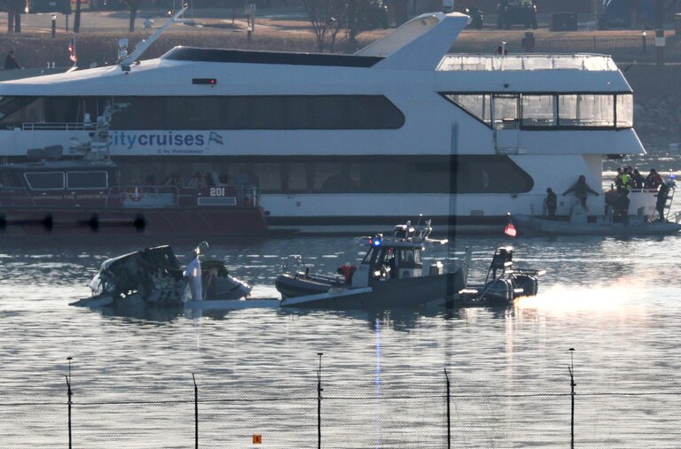 ARLINGTON, VIRGINIA - JANUARY 30: Emergency response units search the crash site of the American Airlines plane on the Potomac River after the plane crashed on approach to Reagan National Airport on January 30, 2025 in Arlington, Virginia. The American Airlines flight from Wichita, Kansas collided with a military helicopter while approaching Ronald Reagan National Airport. According to reports there were no survivors amongst the 67 people on board both aircraft.