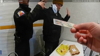 This image, provided by the Altoona Police Department, shows body camera footage of police officers arresting Luigi Mangione in Altoona, Pa., on Dec. 9, 2024.(Altoona Police Department via AP)