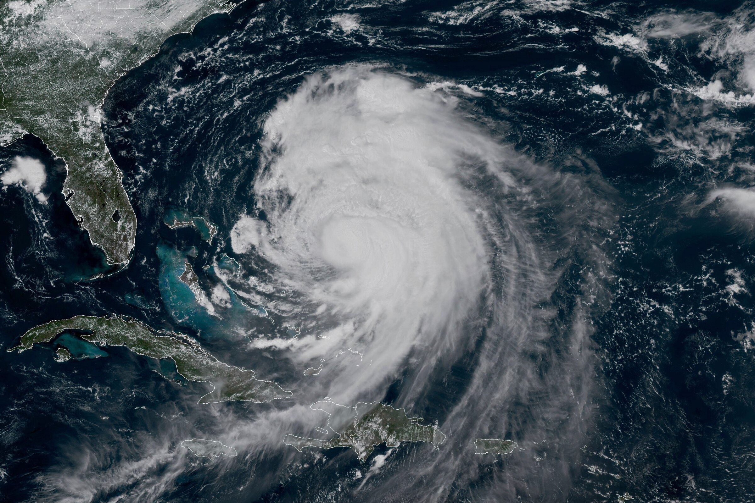 This GOES-19 GeoColor satellite image taken Tuesday, Aug. 19, 2025 at 1:20 p.m. EDT and provided by NOAA, shows Hurricane Erin churning slowly toward the eastern U.S. coast. (NOAA via AP)