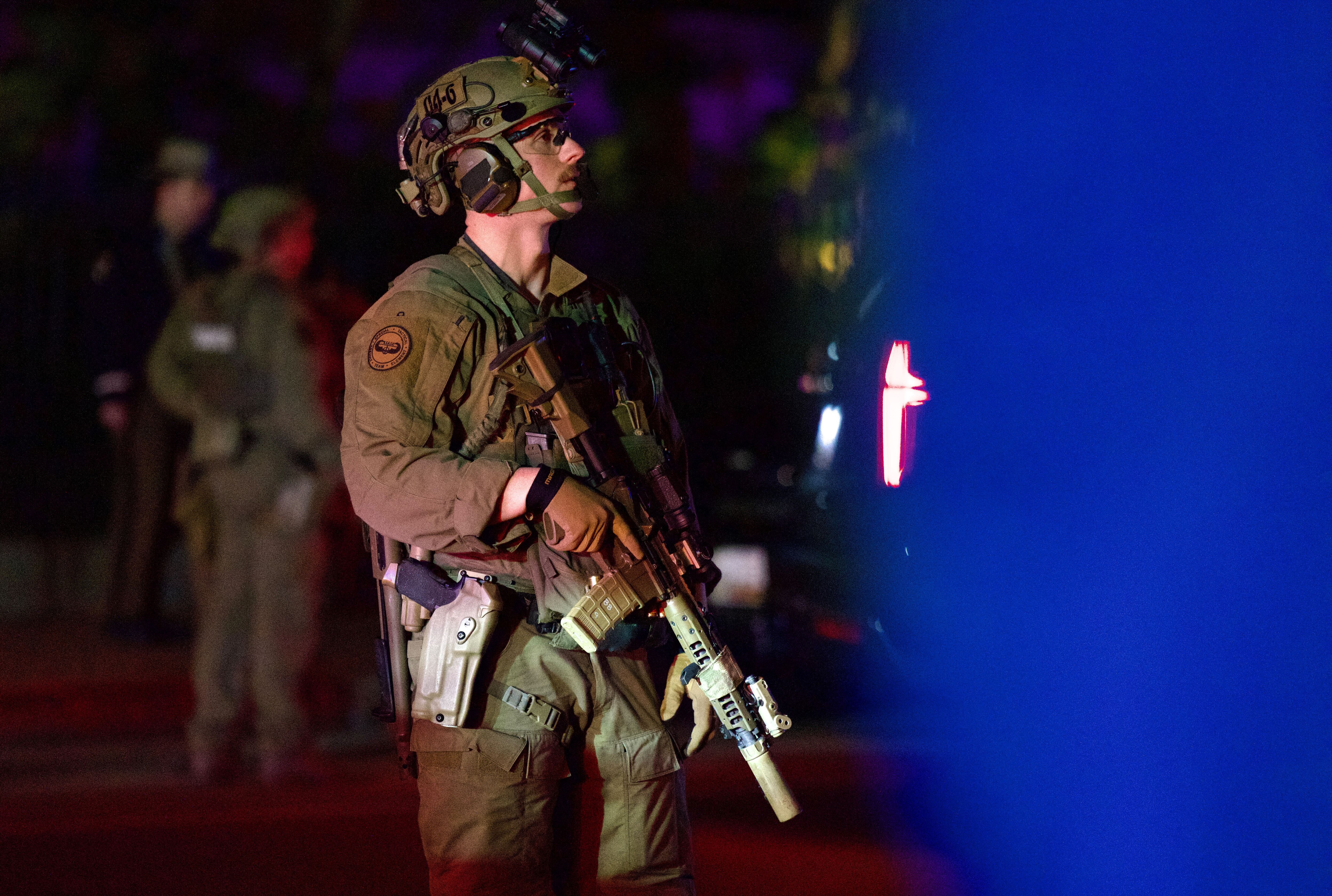 A police officer stands outside the Maryland State House on Feb. 29, 2024. A threat prompted a lockdown, and later, the evacuation of the building.