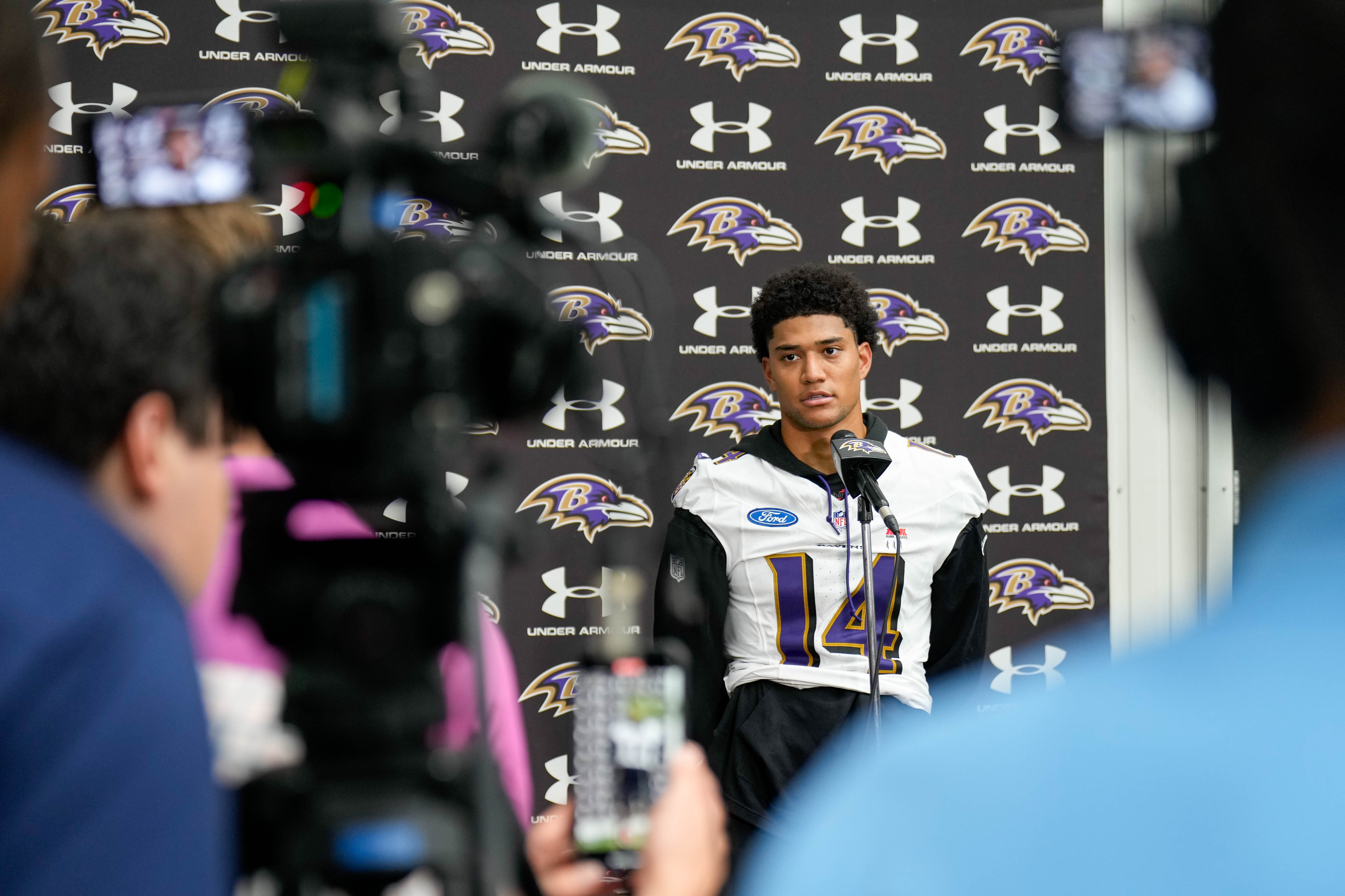 Ravens safety Kyle Hamilton takes questions from reporters following the team’s mandatory minicamp on June 18.