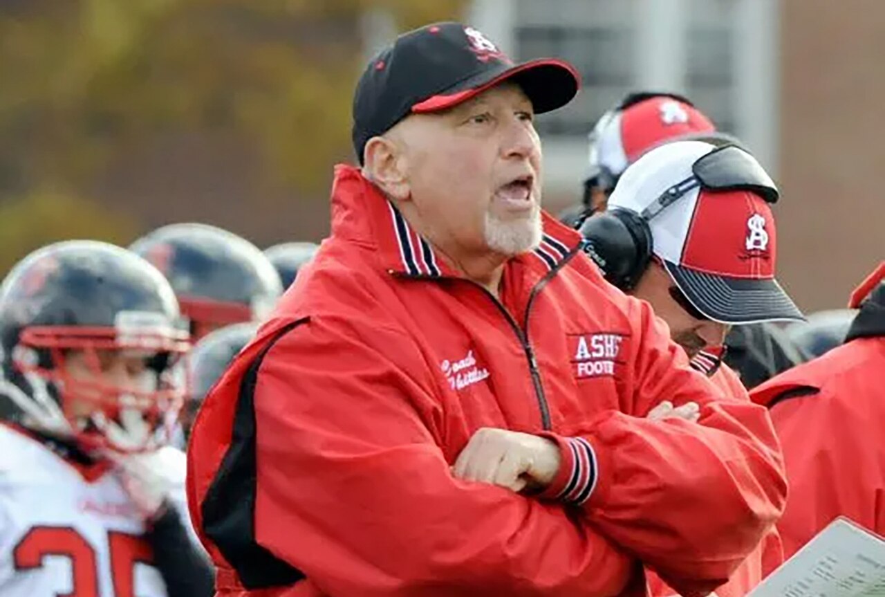 The late Mike Whittles, who took over a downtrodden Archbishop Spalding football program in 1999 and set a goal of seeing the team evolve into one capable of competing for the MIAA A Conference championship. After winning four titles in the B Conference, Whittles' final team moved up to the A Conference in 2011 and made the league playoffs. He lost a battle with Pancreatic cancer three months later, but not before achieving his goal and becoming an enduring source of inspiration for all who knew him.