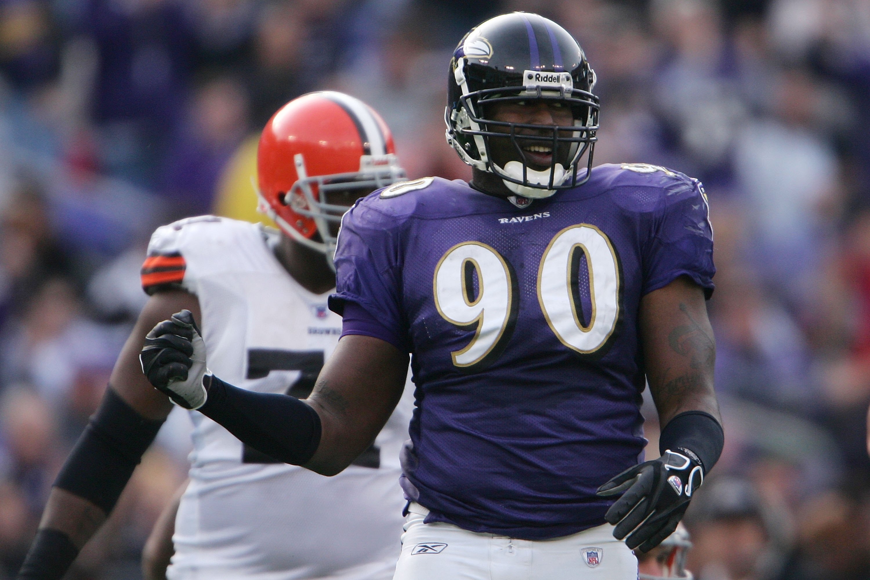 BALTIMORE - DECEMBER 17:  Trevor Pryce #90 of the Baltimore Ravens celebrates after sacking  Derek Anderson #3 of the of the Cleveland Browns at M&T Bank Stadium December 17, 2006 in Baltimore, Maryland.