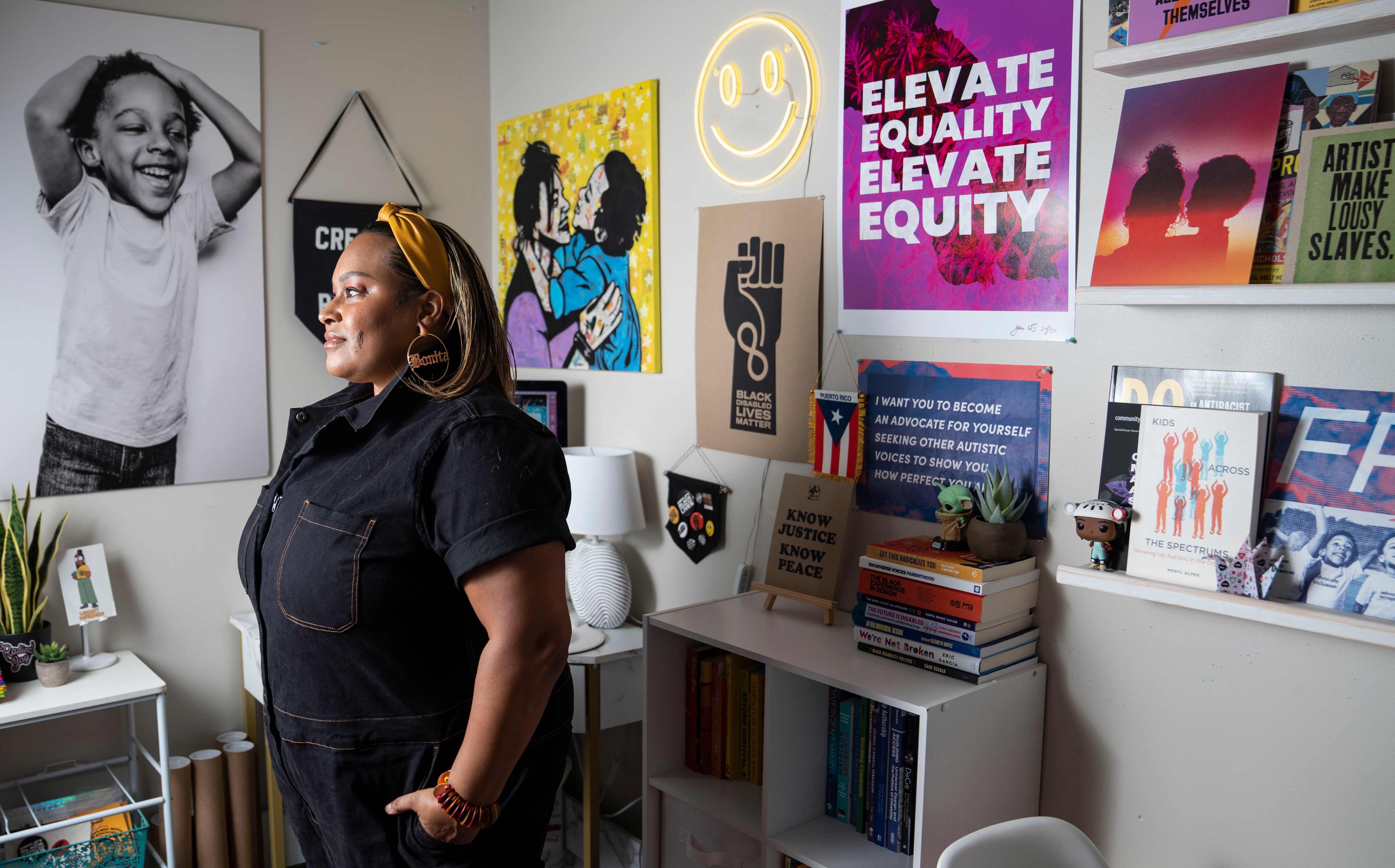 Jen White-Johnson poses for a portrait inside her home office in Baltimore, Friday, Sept. 8, 2023.