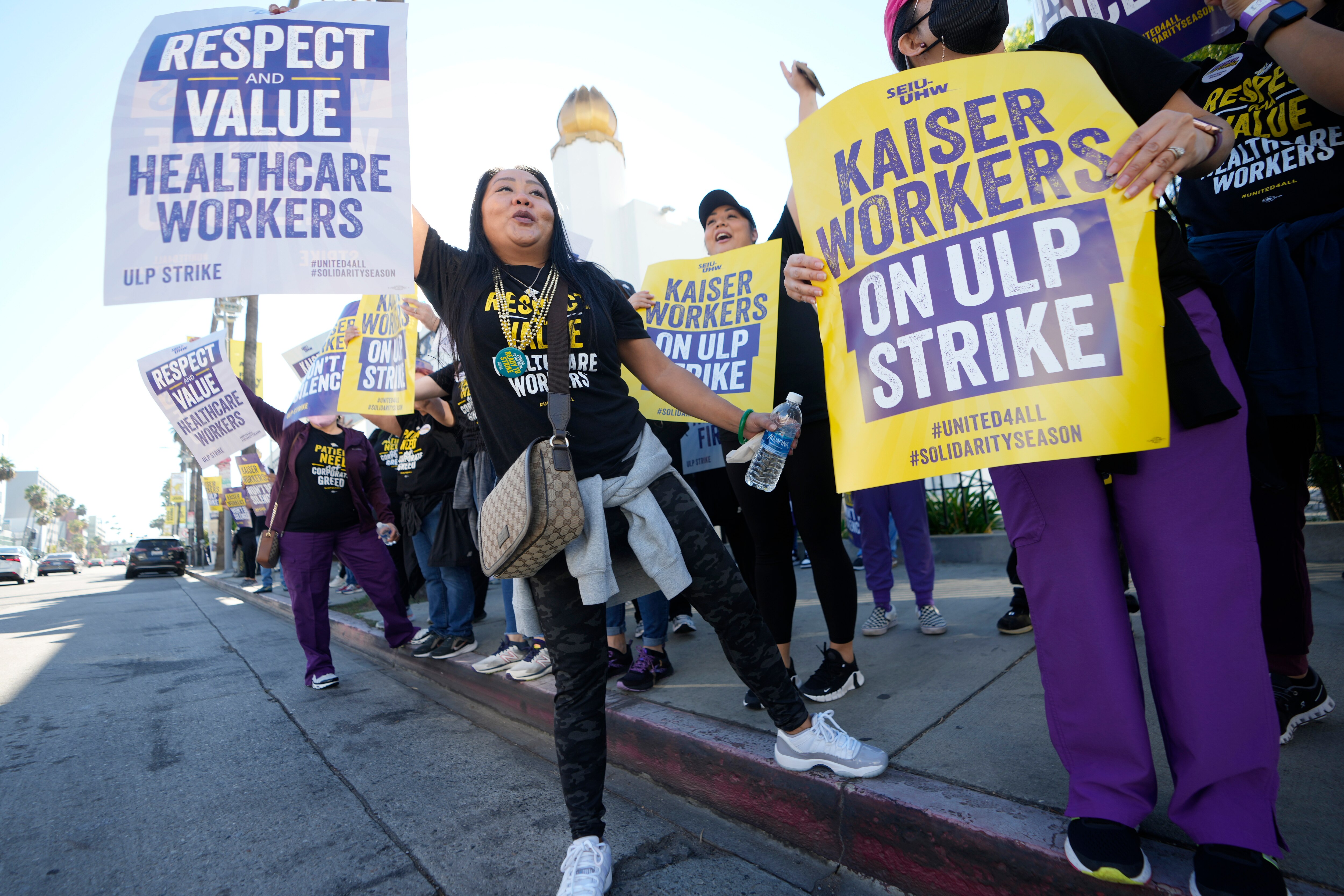 Kaiser Permanente healthcare workers rally outside Kaiser Permanente Los Angeles Medical Center in Los Angeles on Wednesday, Oct. 4, 2023. (AP Photo/Damian Dovarganes)