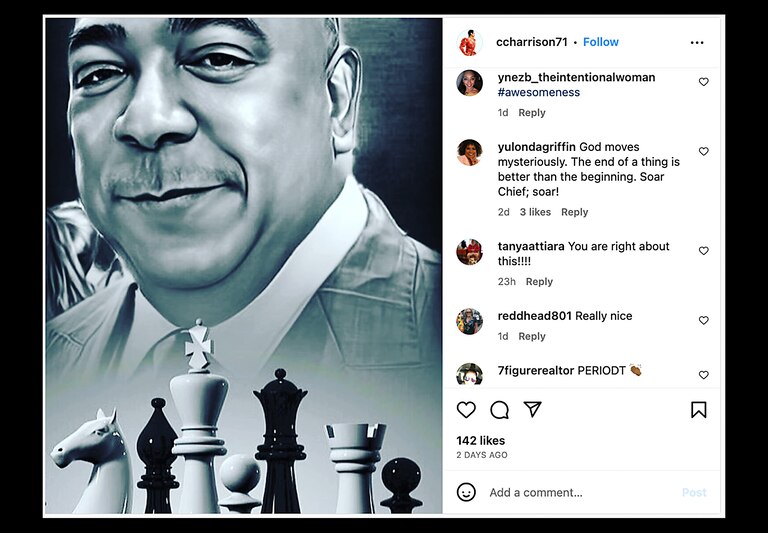 Black and white portrait of Michael Harrison with chess pieces in the foreground.