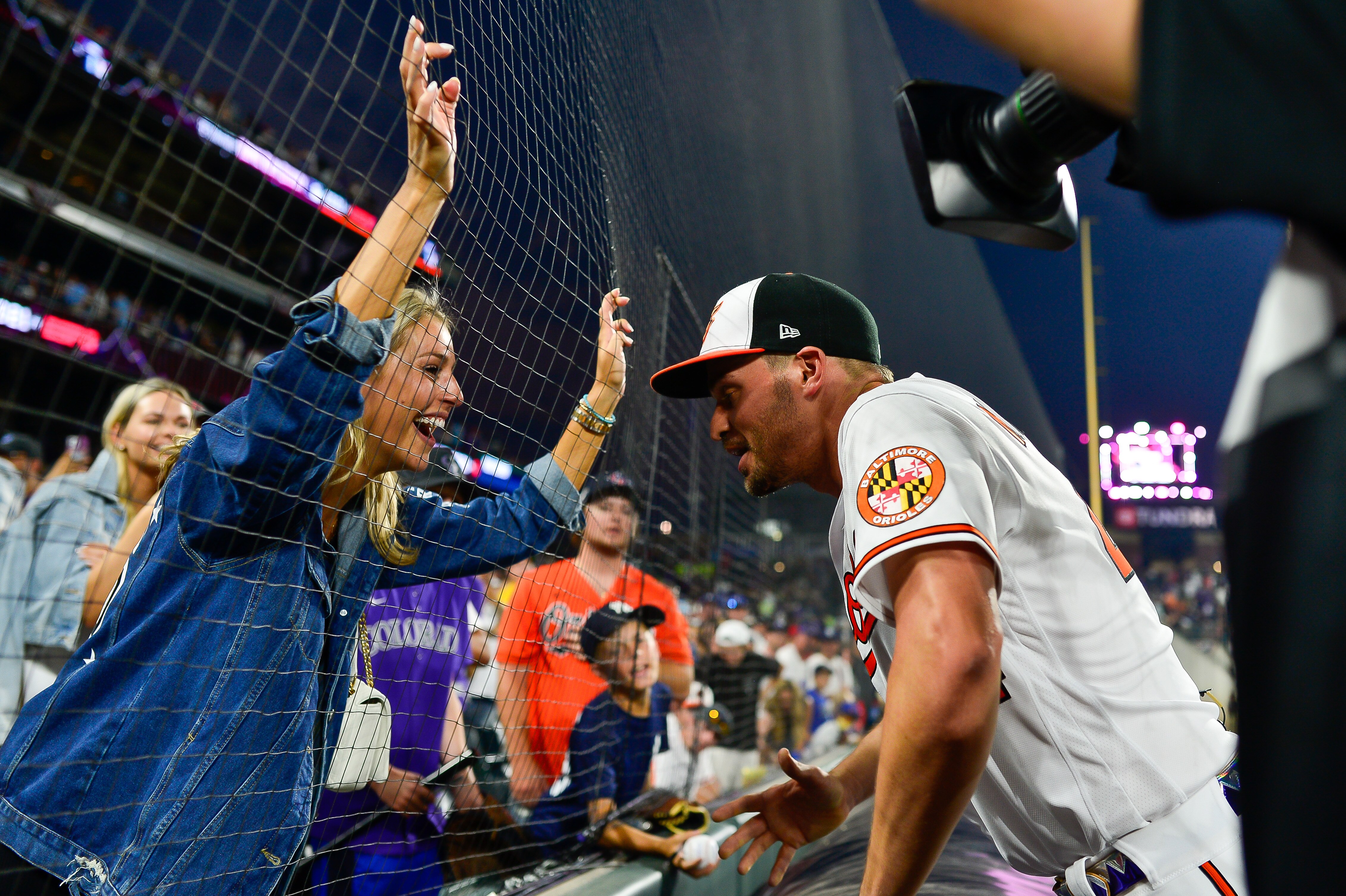 Trey Mancini of the Orioles celebrates with Sara Perlman, who is now his wife, after the 2021 Home Run Derby in Denver.
