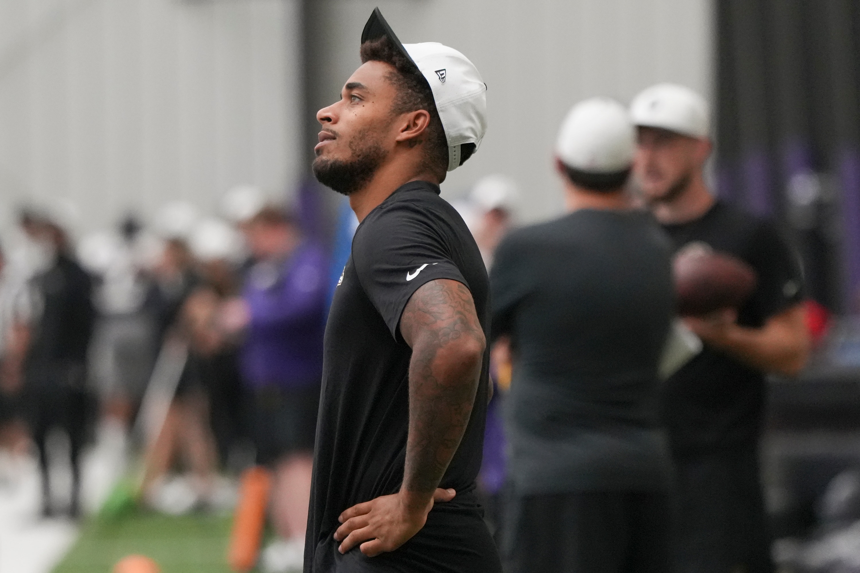 Cornerback Jaire Alexander, photographed observing practice Wednesday during the Ravens' mandatory minicamp, will reunite with college teammate Lamar Jackson in Baltimore.
