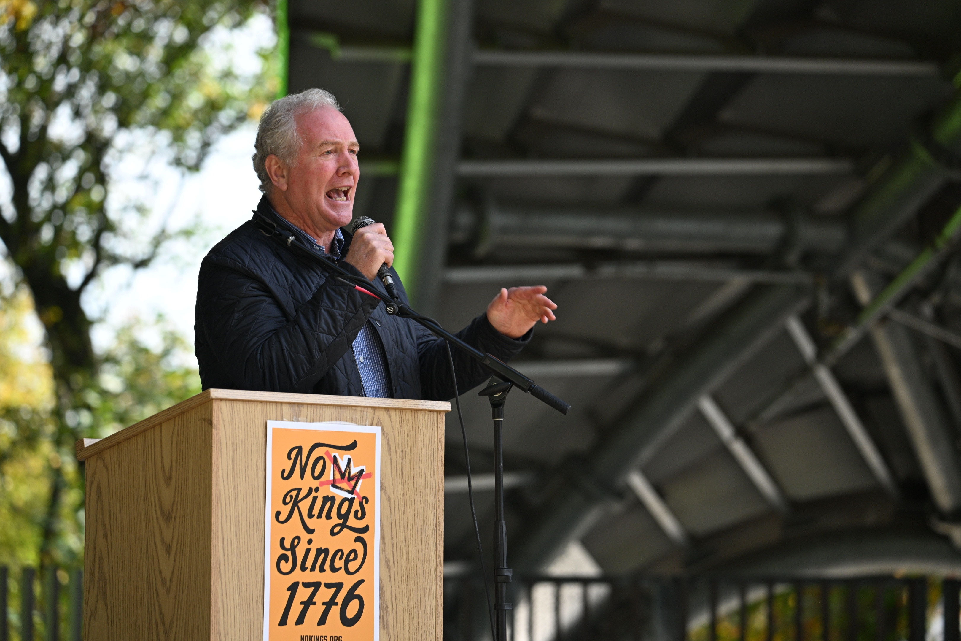 Saturday, Oct. 18, 2025 - Senator Chris Van Hollen addresses the crowd at Symphony Woods Park in Columbia during the No Kings rally.