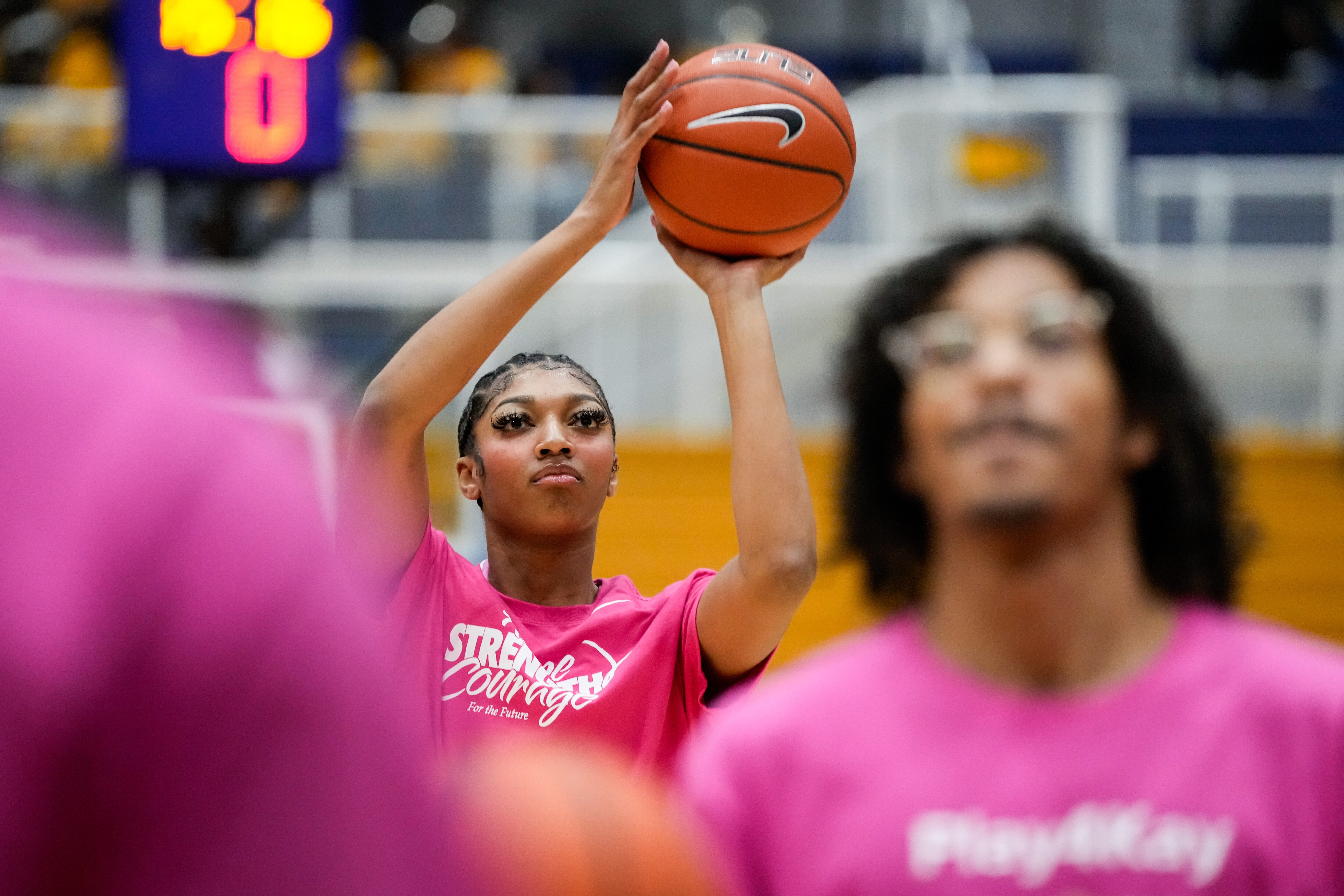 Angel Reese, shown warming up before a game at Coppin State, had 11 points and 16 rebounds Sunday as LSU beat Tennessee.