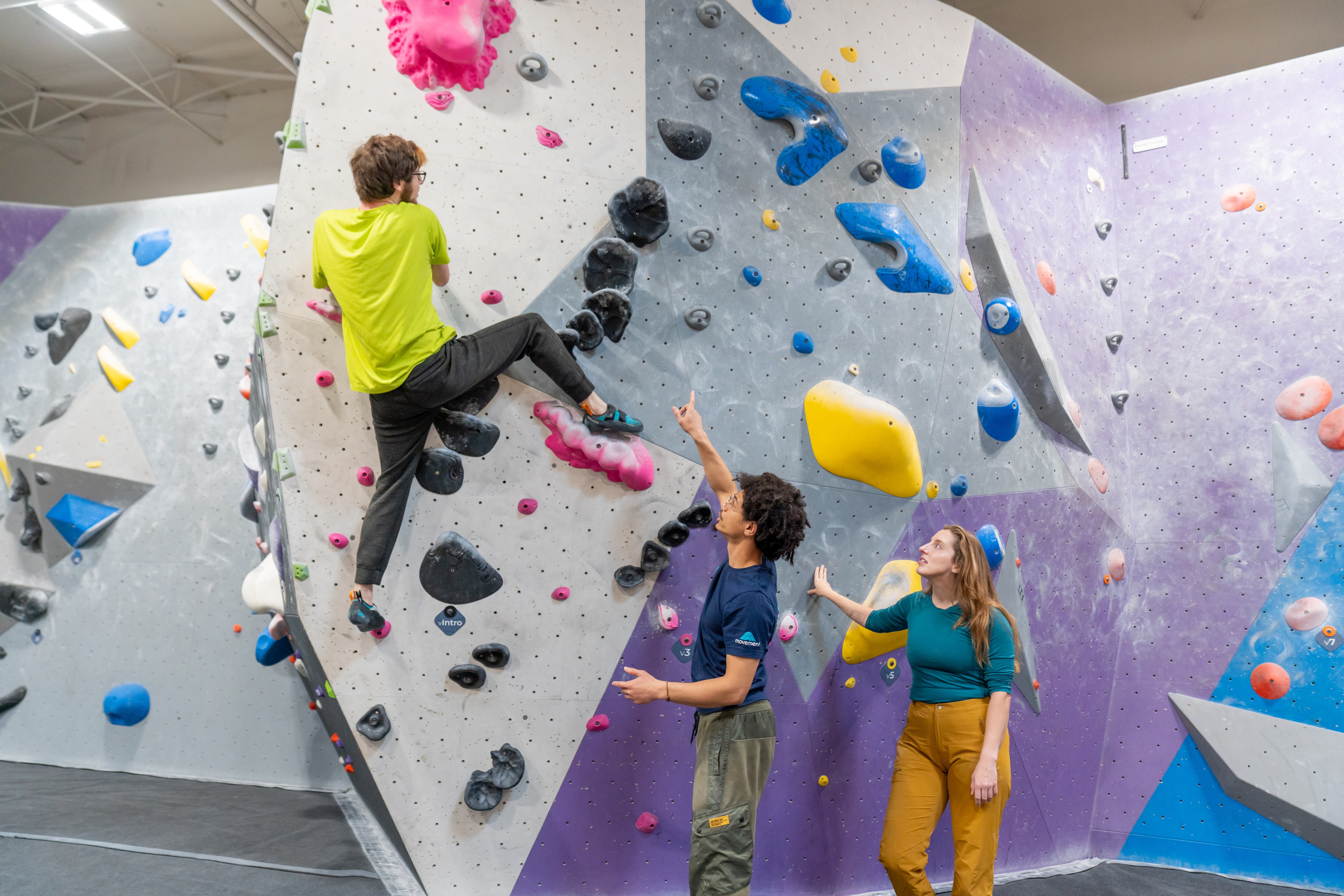 A patron rock climbs at Movement Gym inside Union Collective, a former Sears warehouse in Baltimore.
