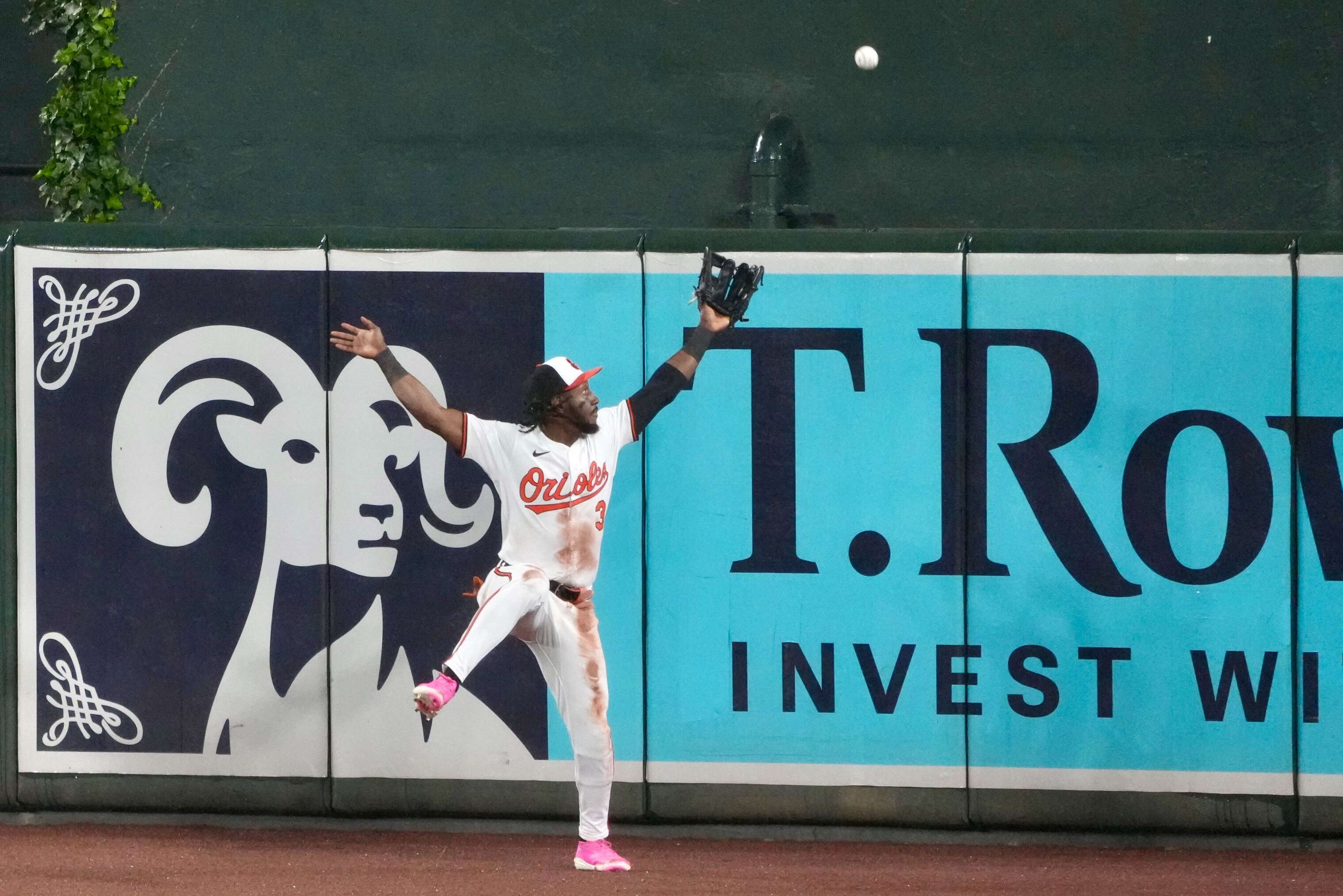 Orioles center fielder Jorge Mateo can't bring in a fly ball off the bat of Cardinals' right fielder Jordan Walker during a game against the St. Louis Cardinals at Oriole Park at Camden Yards in Baltimore, Md. on Tuesday, May 27, 2025.