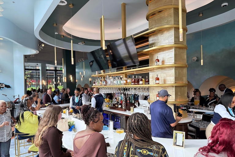 WEDNESDAY, OCTOBER 14, 2026 - Baltimore Peninsula welcomed its newest tenant at a ribbon cutting Wednesday, though the splash Jamaican Chinese fusion restaurant won't open to the public until later this month.