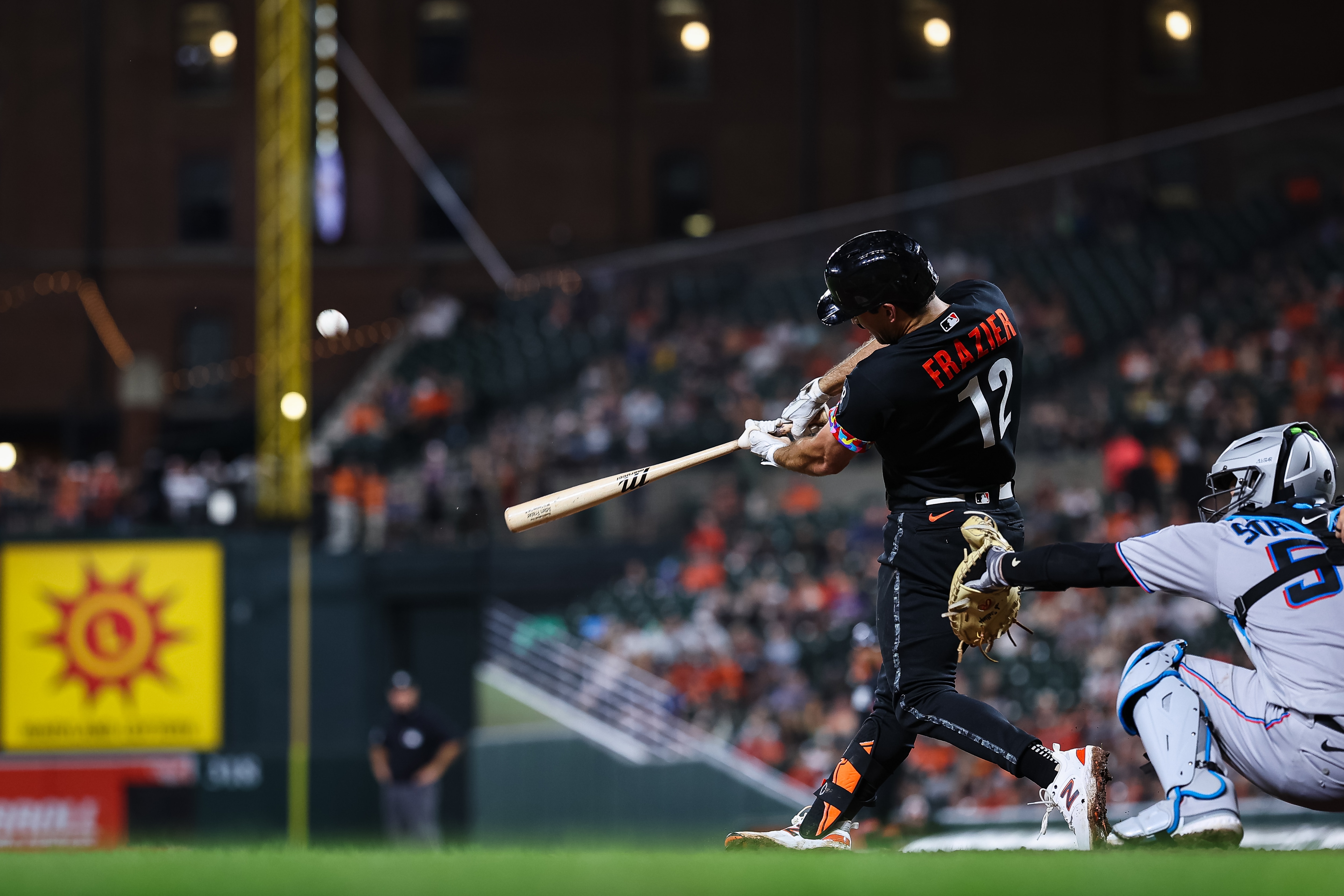 Adam Frazier hits a home run against the Marlins on Friday. This is the first season in which Frazier has hit more than 10 homers in his career.