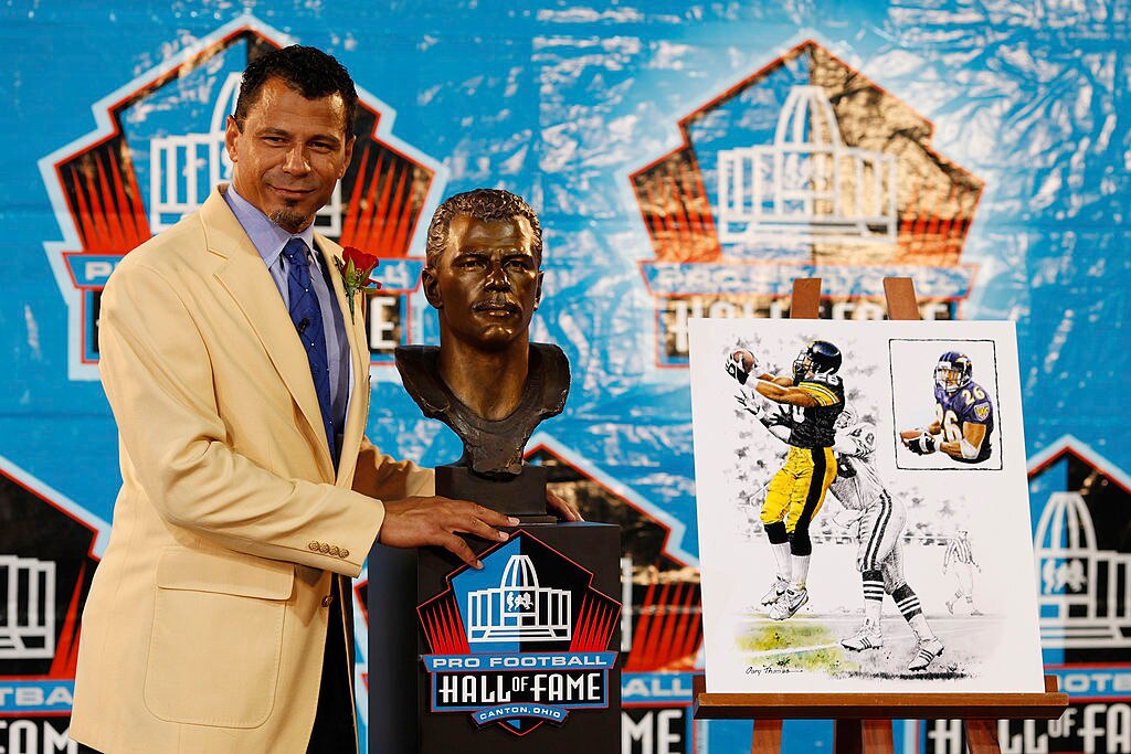 CANTON, OH - AUGUST 8: Rod Woodson poses with his bust at his induction into the Pro Football Hall of Fame during the 2009 enshrinement ceremony at Fawcett Stadium on August 8, 2009 in Canton, Ohio.