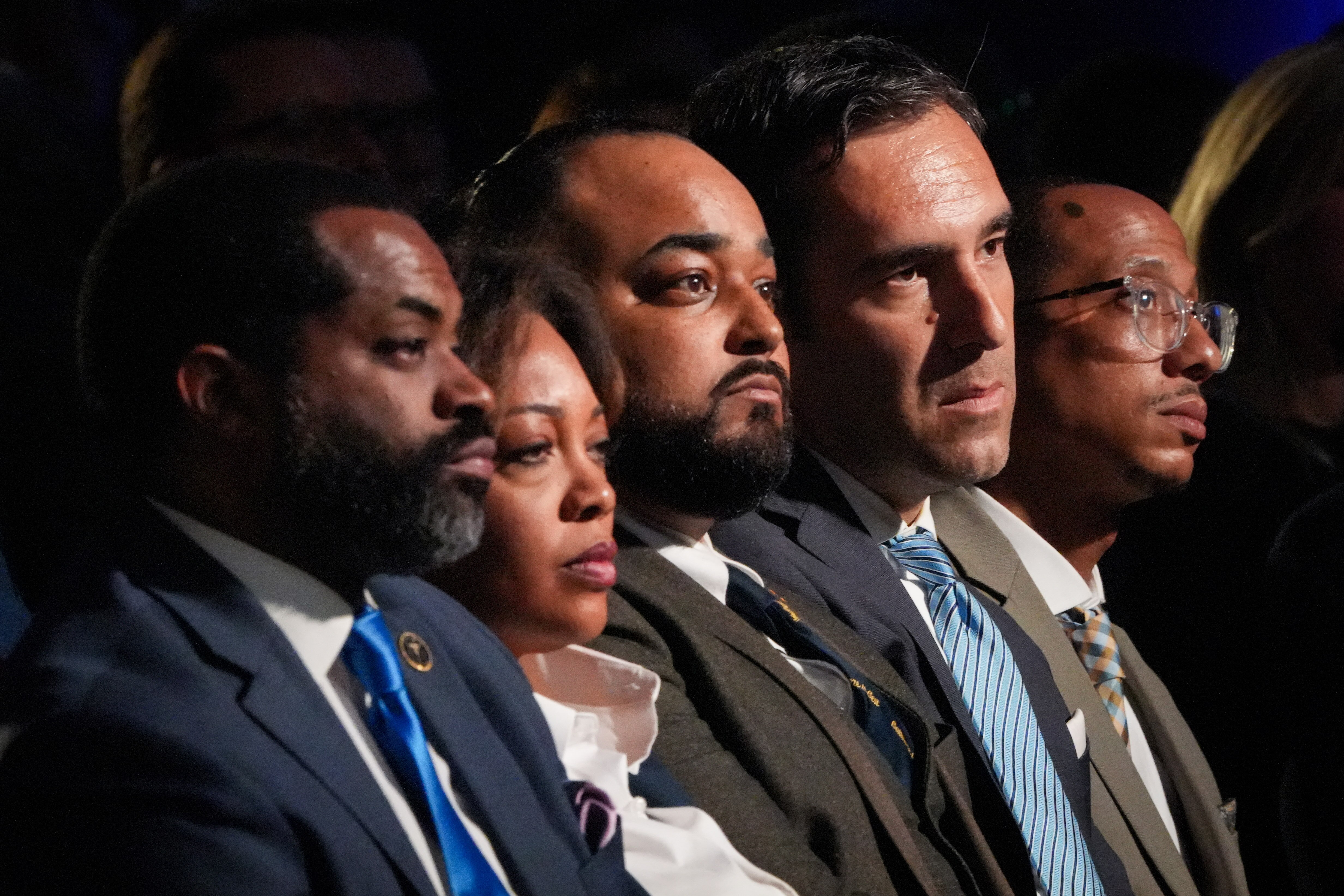 Baltimore City Council members, including (from left) Council President Nick Mosby, Phylicia Porter, Kristerfer Burnett, Zeke Cohen and John Bullock listen as Mayor Brandon Scott gives the annual State of the City address on Monday, April 17. The event was held at the Middle Branch Fitness and Wellness Center in South Baltimore.