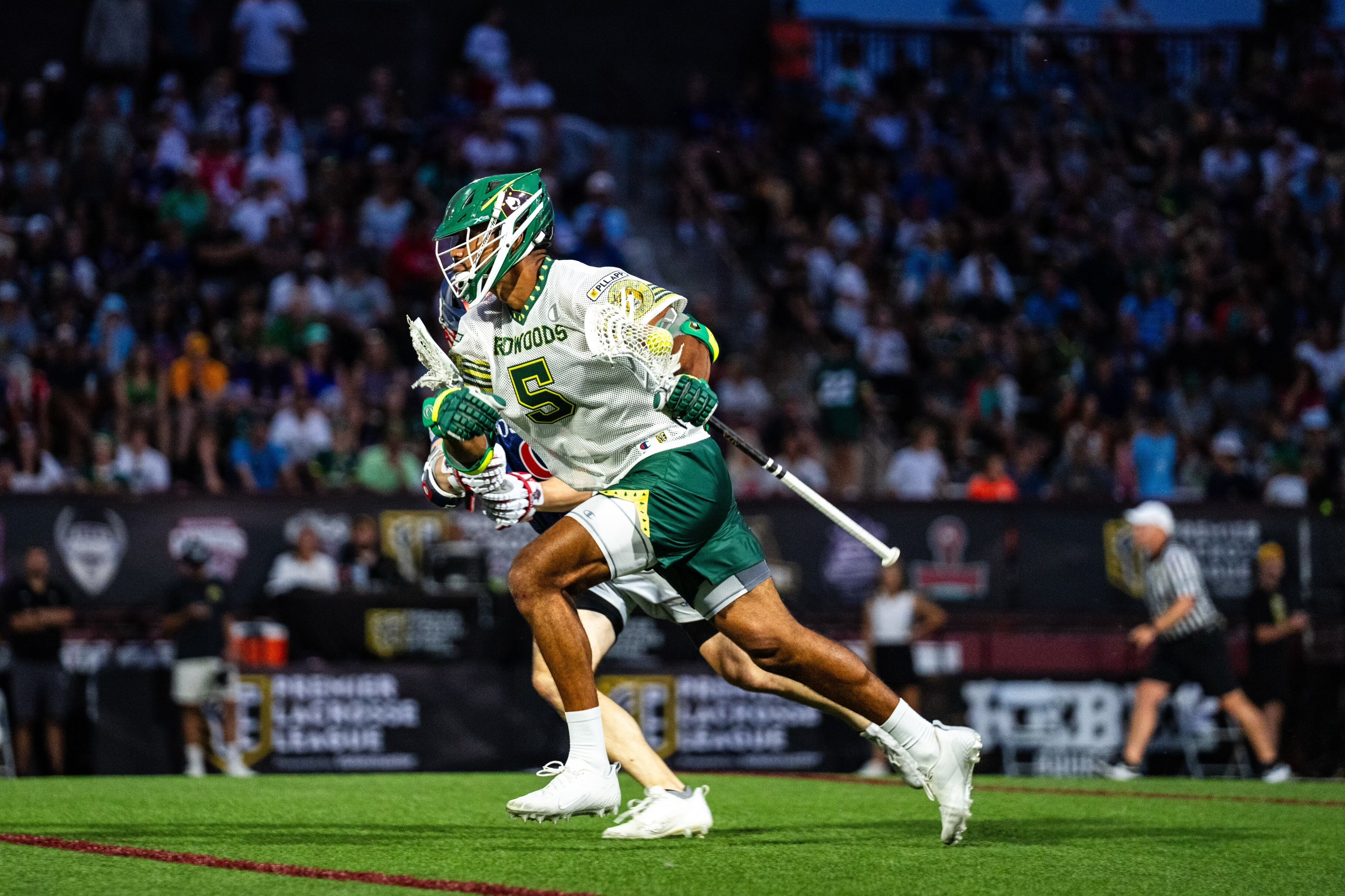 Midfielder Romar Dennis plays in Premier Lacrosse League game as a member of the California Redwoods.