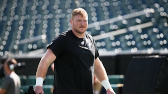 Philadelphia Eagles' Cam Jurgens warms up before an NFL football game against the Denver Broncos, Sunday, Oct. 5, 2025, in Philadelphia. (AP Photo/Matt Slocum)