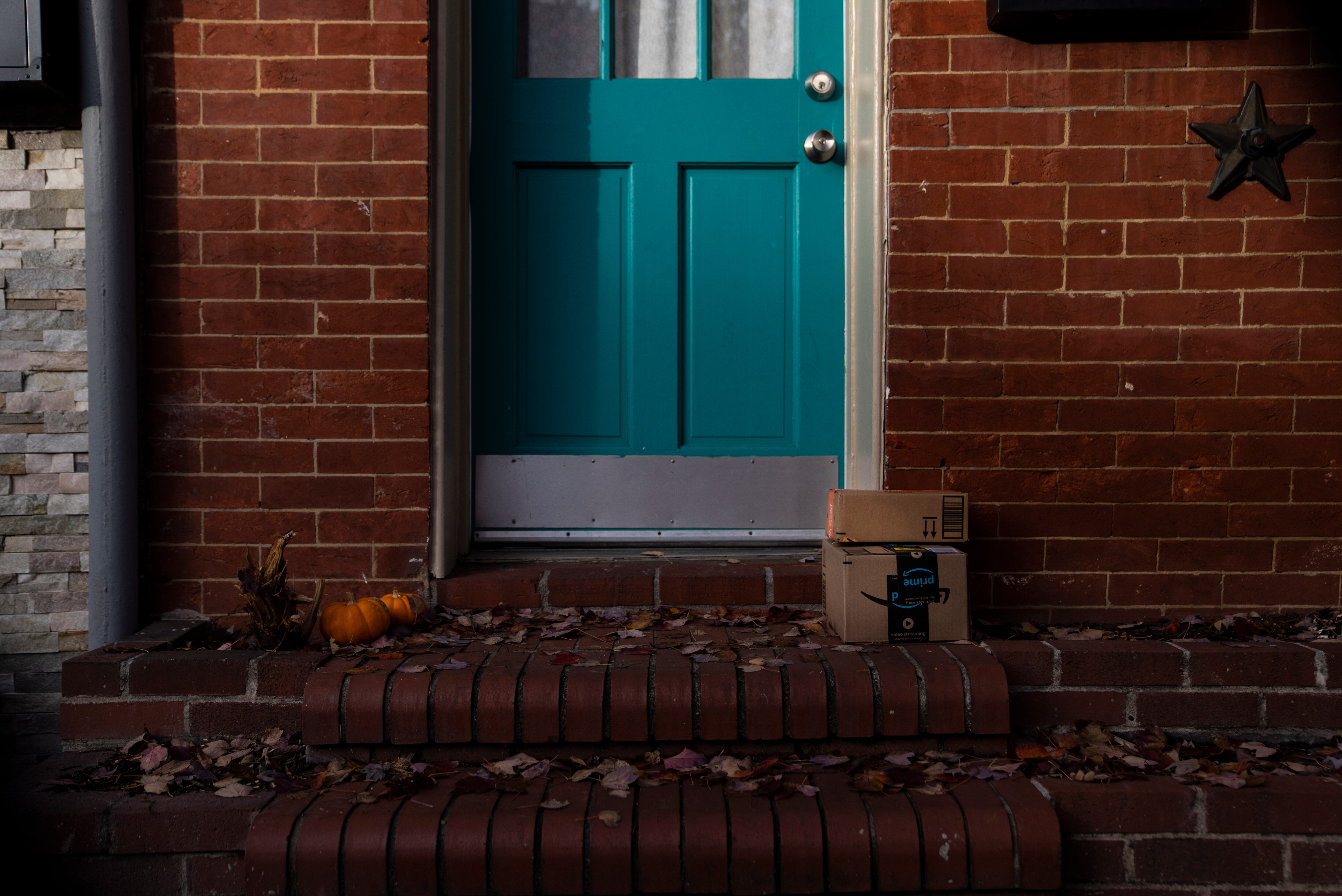 Amazon packages on the front steps of a Baltimore home, Tuesday, December 17, 2024.
