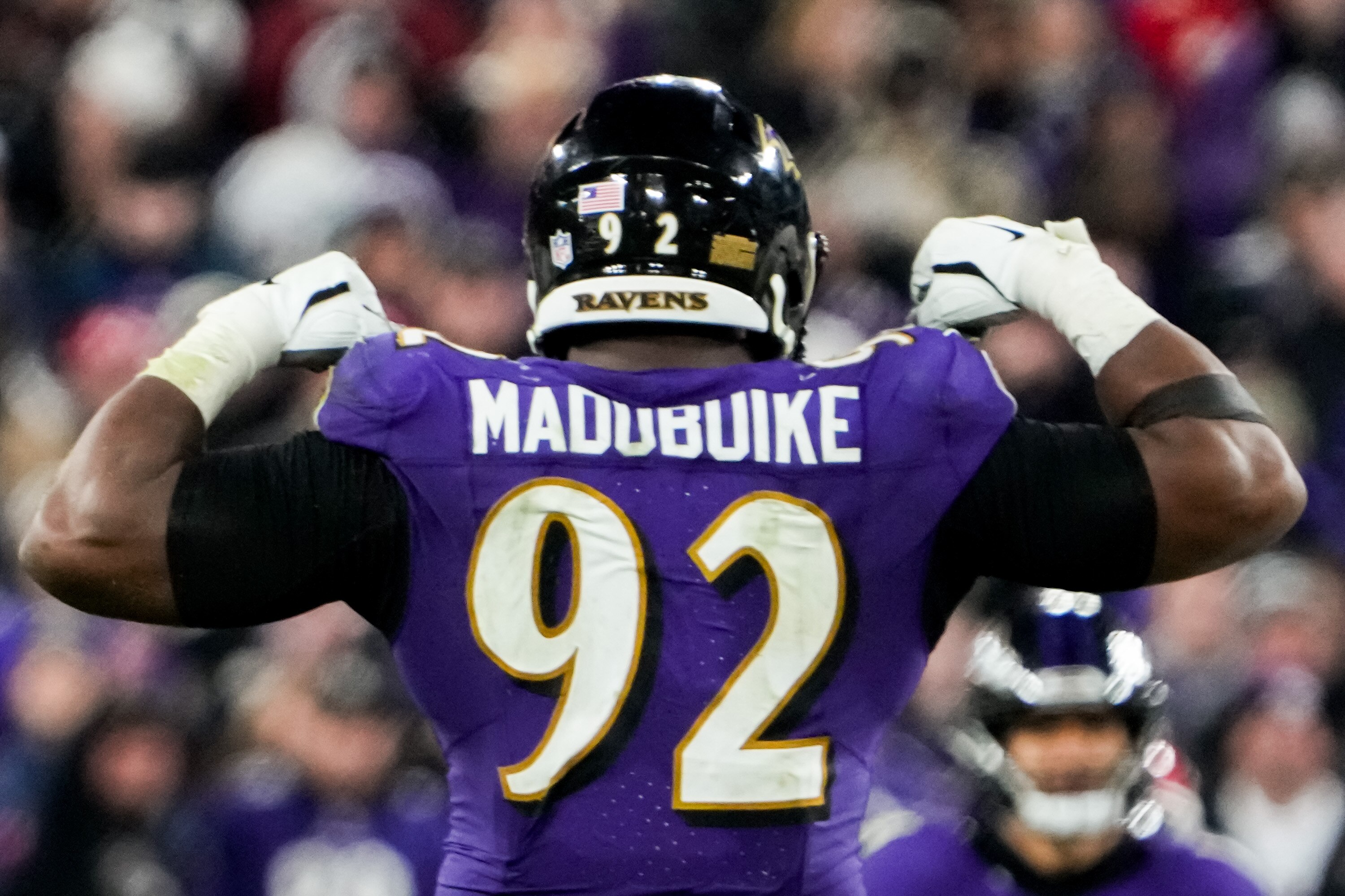 Baltimore Ravens defensive tackle Justin Madubuike (92) celebrates after sacking Kansas City Chiefs quarterback Patrick Mahomes (15) during the fourth quarter of the AFC Championship game at M&T Bank Stadium on Sunday, Jan. 28, 2024.