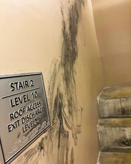 The stairwell at the Berkshires at Town Center Apartments in Towson was still smeared in soot one week after a Jan. 19 fire sent dark smoke throughout the building.