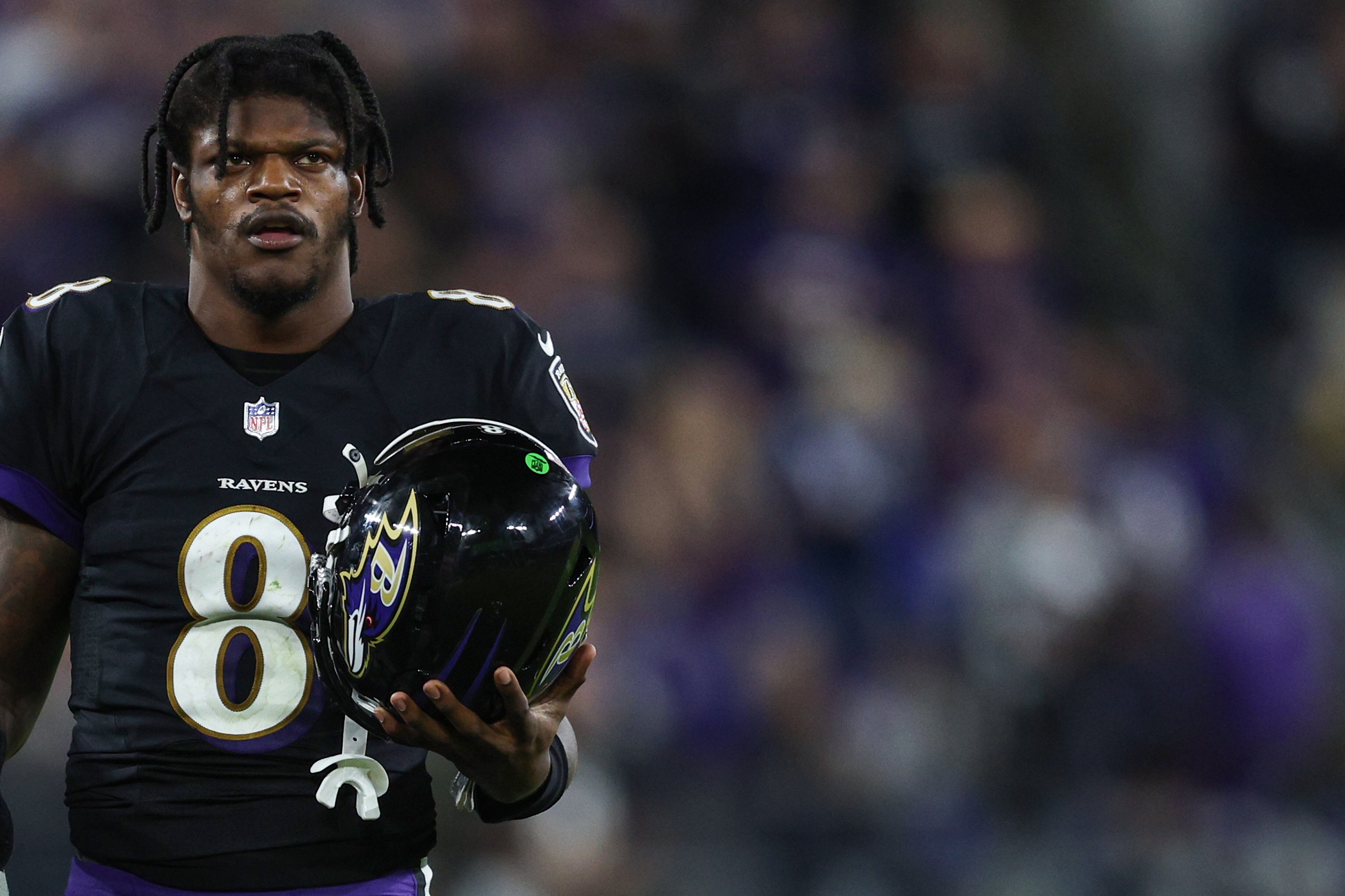 Quarterback Lamar Jackson #8 of the Baltimore Ravens looks on against the Indianapolis Colts at M&T Bank Stadium on October 11, 2021 in Baltimore, Maryland.