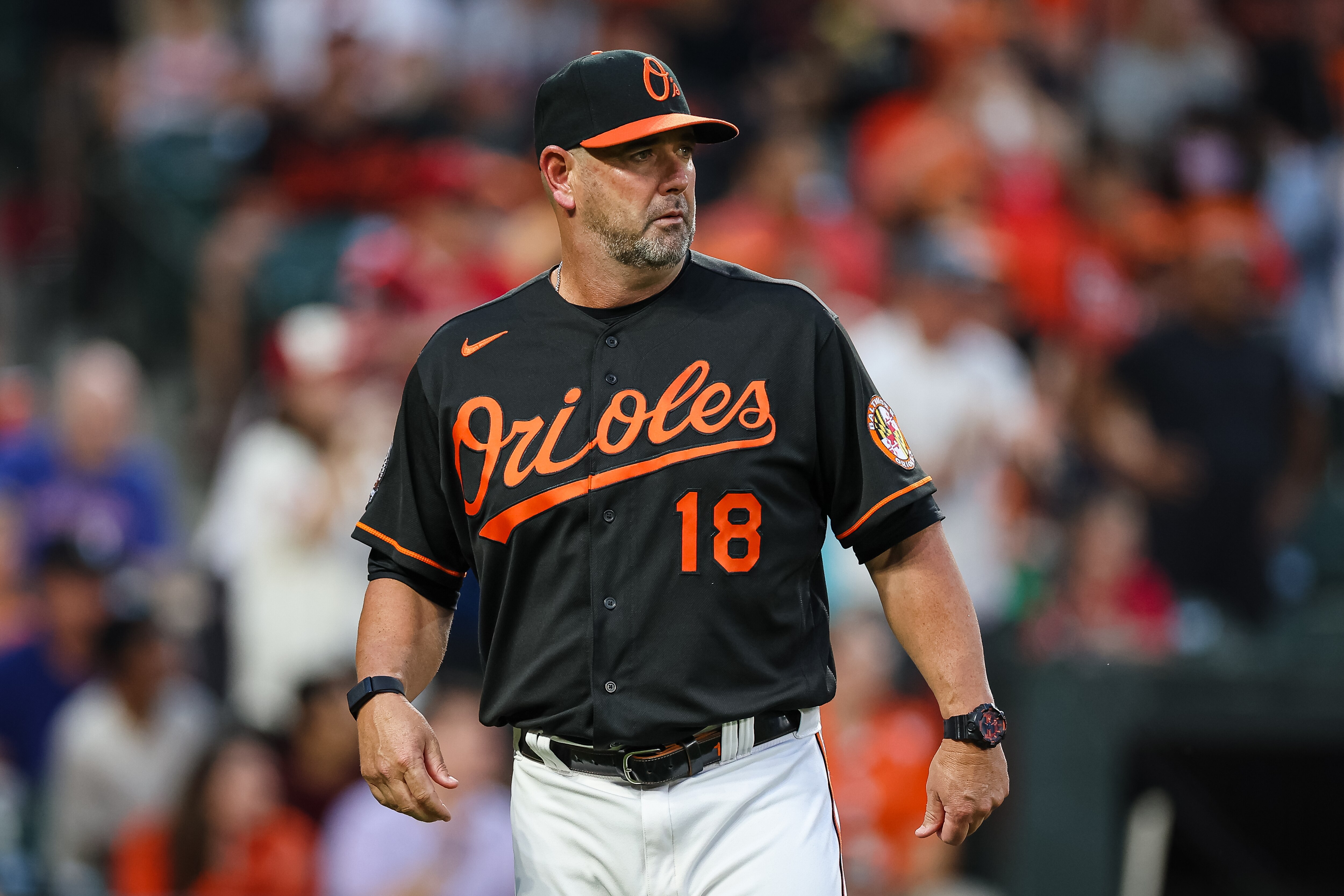Manager Brandon Hyde #18 of the Baltimore Orioles looks on during the third inning against the Los Angeles Angels at Oriole Park at Camden Yards on July 8, 2022 in Baltimore, Maryland.