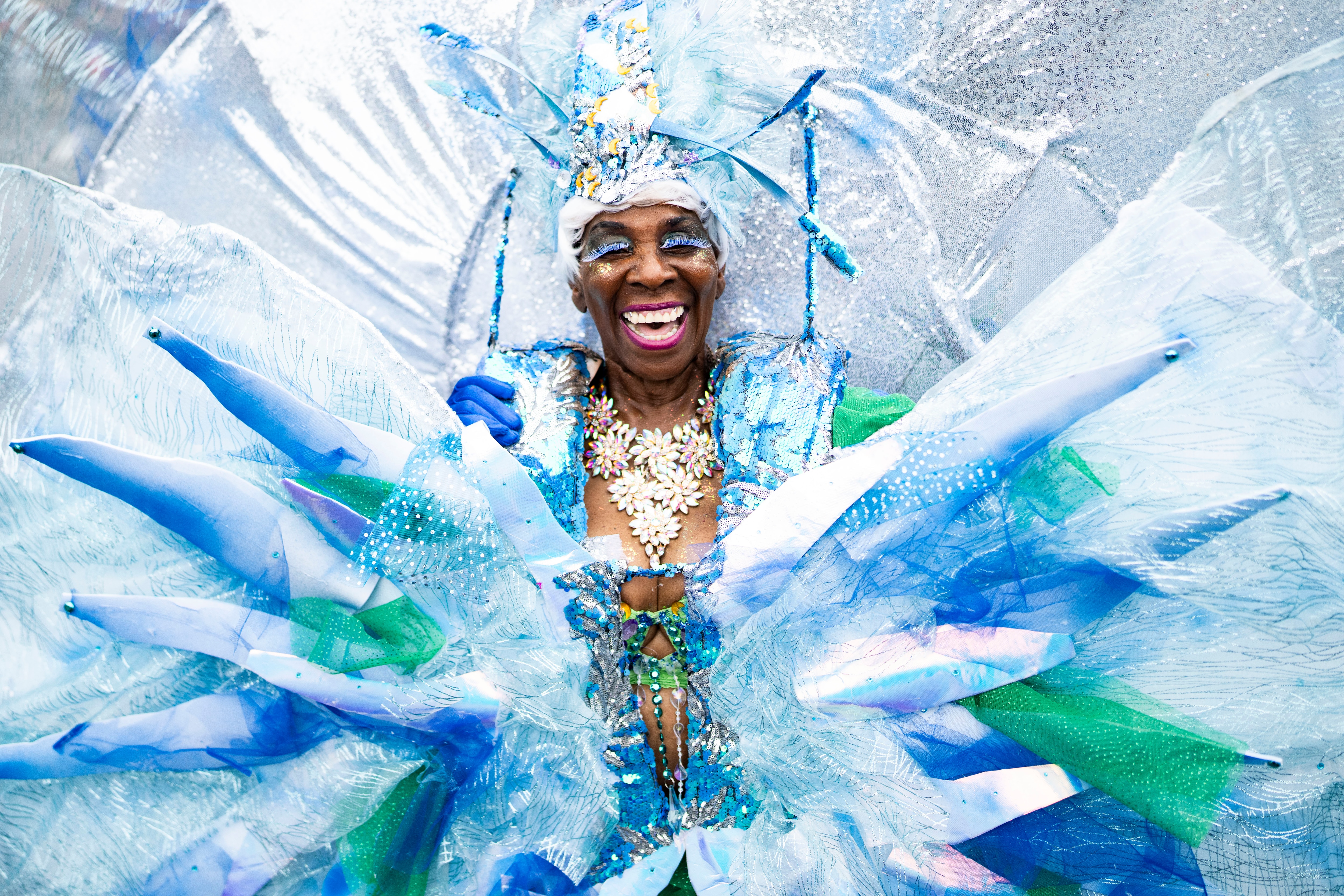 Diane Marshall, also known by her stage name Flambe, participates in the Parade of Bands during the Baltimore Washington One Carnival on Saturday.