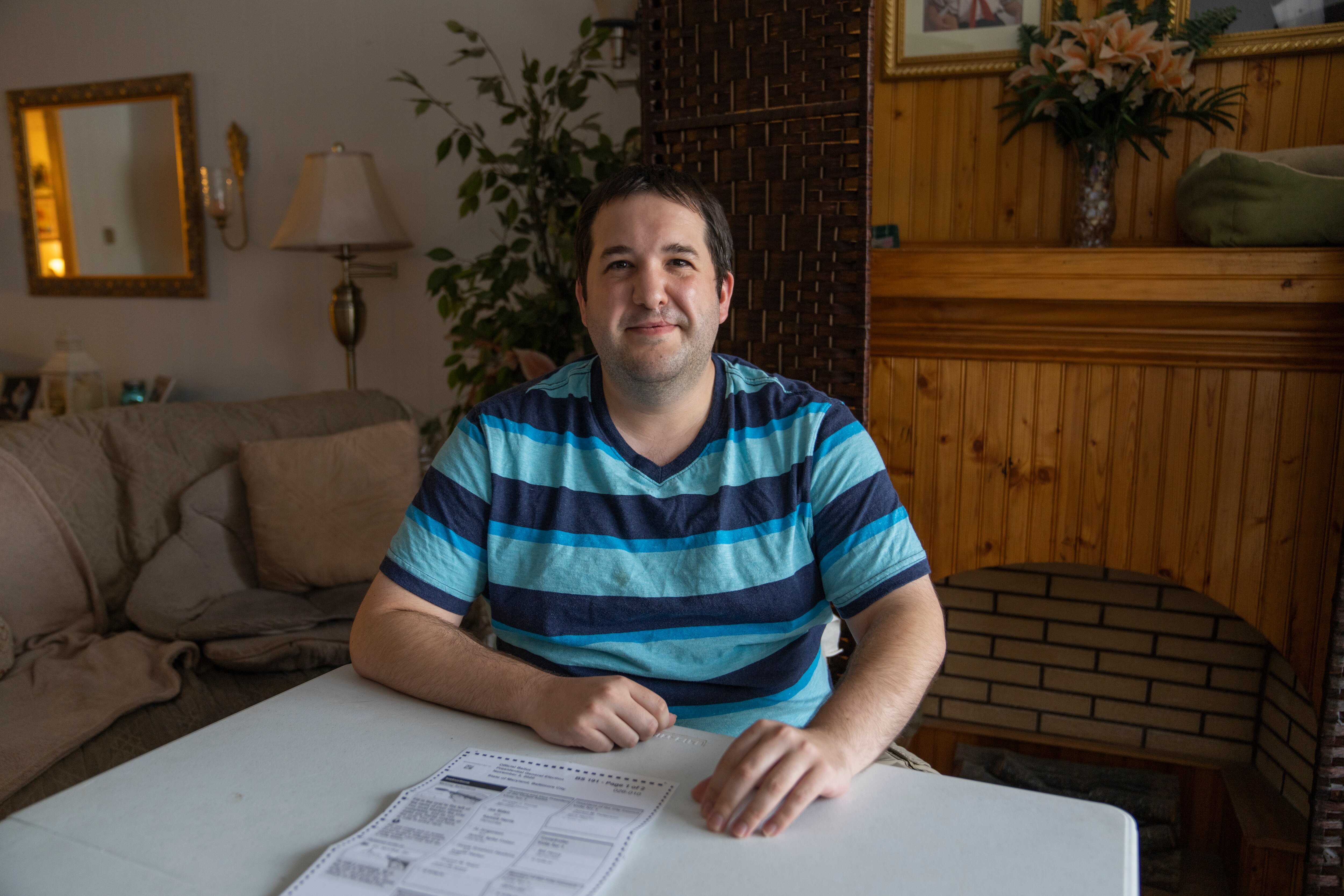 Nick Frisone sits at his home after receiving his long lost 2020 ballot. Along with Nick, numerous neighbors on his block recieved their 2020 ballots 2 years late.