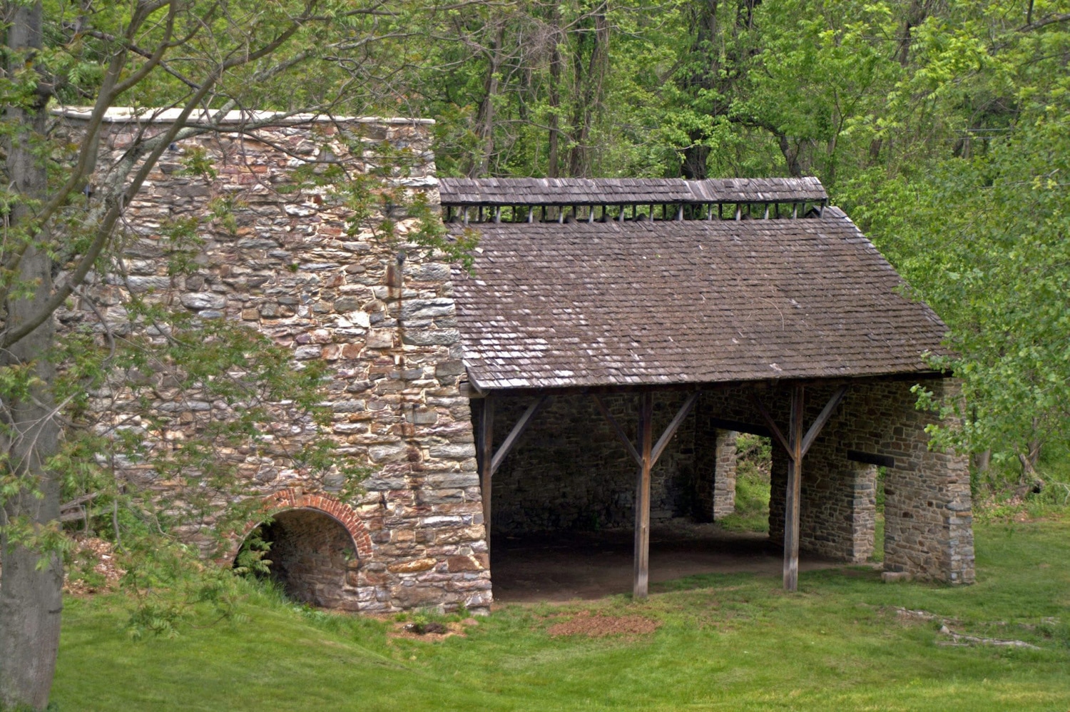 The history of Catoctin Furnace represents, in microcosm, the history of the Industrial Revolution in America. From 1776 to 1903 iron companies mined the rich ore banks near Catoctin Mountain, smelted it in furnaces, and cast both raw pig iron and iron implements of every description.