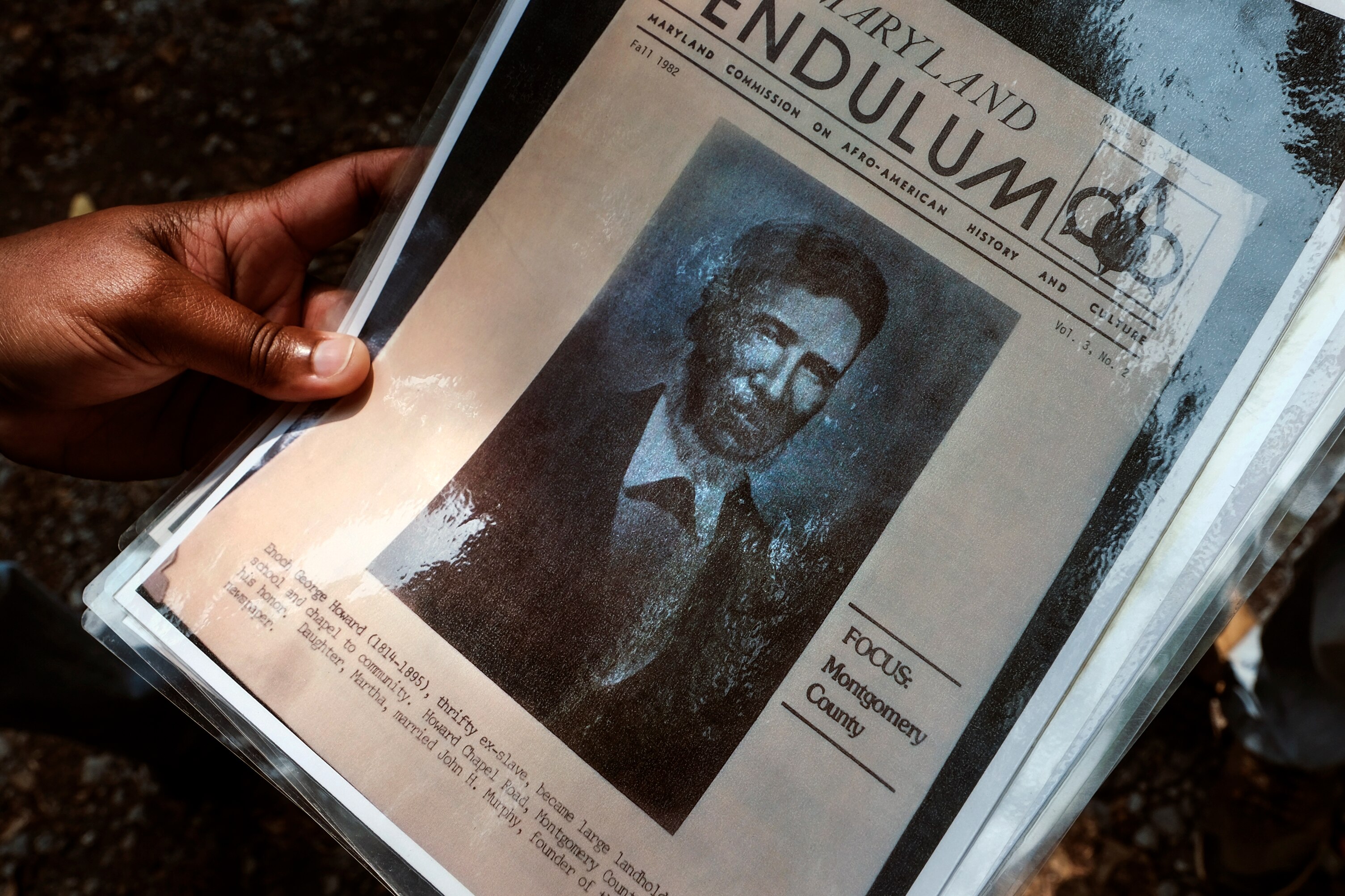 Maryland State Park Service Superintendent Angela Crenshaw looks at historic photographs during a tour Patuxent River Park in Montgomery County on August 7, 2025. The state of Maryland is currently working on a project for Freedmen’s State Park, to tell the story of Enoch George Howard, his family and, more broadly, enslaved Marylanders.
