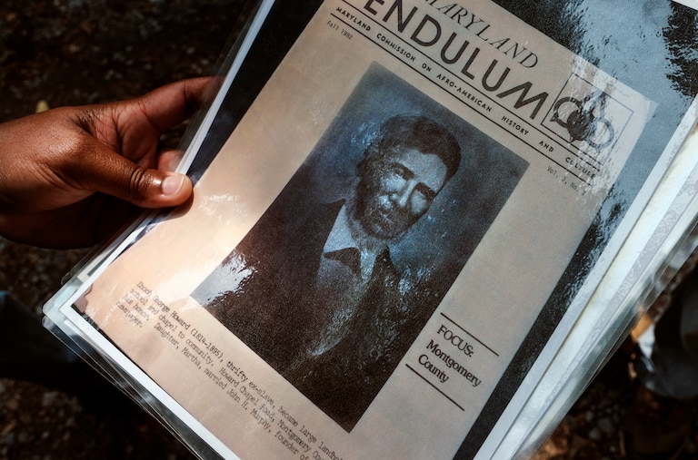 Maryland State Park Service Superintendent Angela Crenshaw looks at historic photographs during a tour Patuxent River Park in Montgomery County on August 7, 2025. The state of Maryland is currently working on a project for Freedmen’s State Park, to tell the story of Enoch George Howard, his family and, more broadly, enslaved Marylanders.