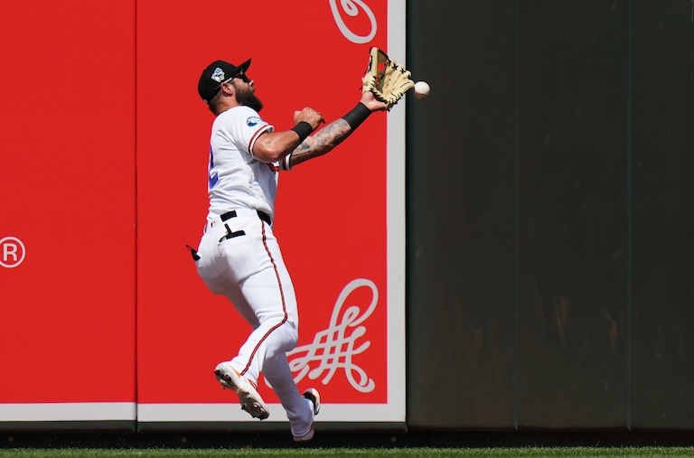 Baltimore Orioles left fielder Weston Wilson is unable to catch a two-run triple hit by Arizona Diamondbacks' Adrian del Castillo during the third inning.
