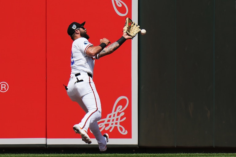 Baltimore Orioles left fielder Weston Wilson is unable to catch a two-run triple hit by Arizona Diamondbacks' Adrian del Castillo during the third inning.