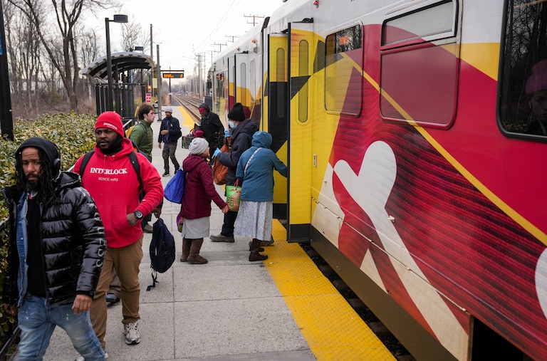 Passengers enter and exit the southbound light rail car as it arrives at the Lutherville Light Rail station in Lutherville, Md. on Monday, February 3, 2025.