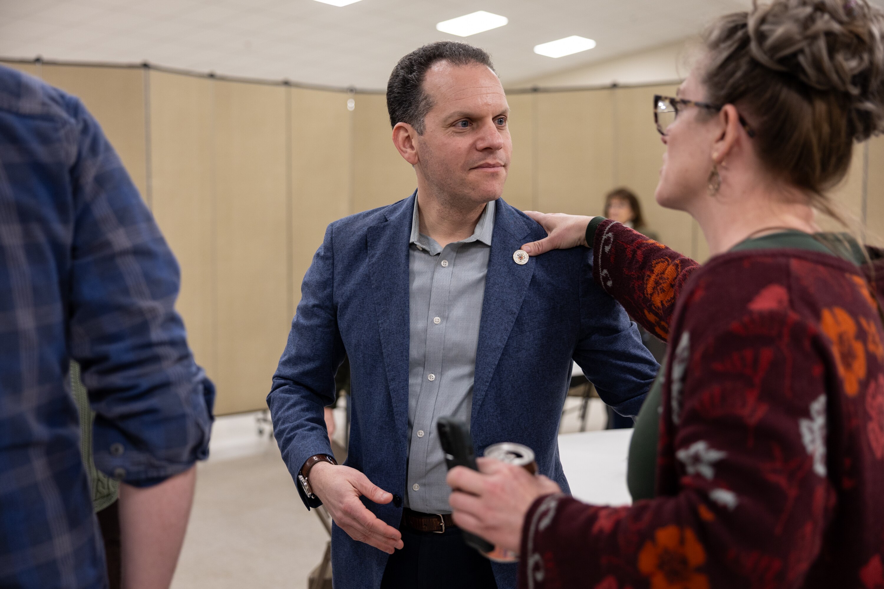 Montgomery County Council member Evan Glass, center, speaks to attendees of a Meet and Greet event at Poolesville Memorial United Methodist Church.