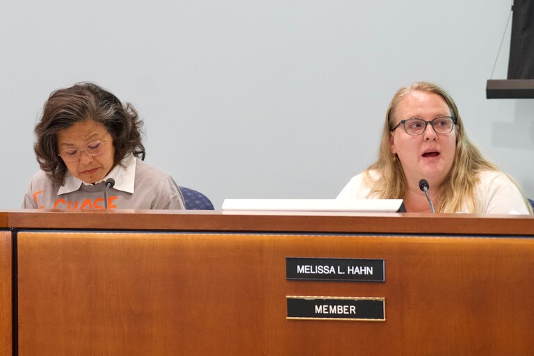 Harford County school board members BangTam Miller, left, and Melissa Hahn, during a board meeting on Tuesday.