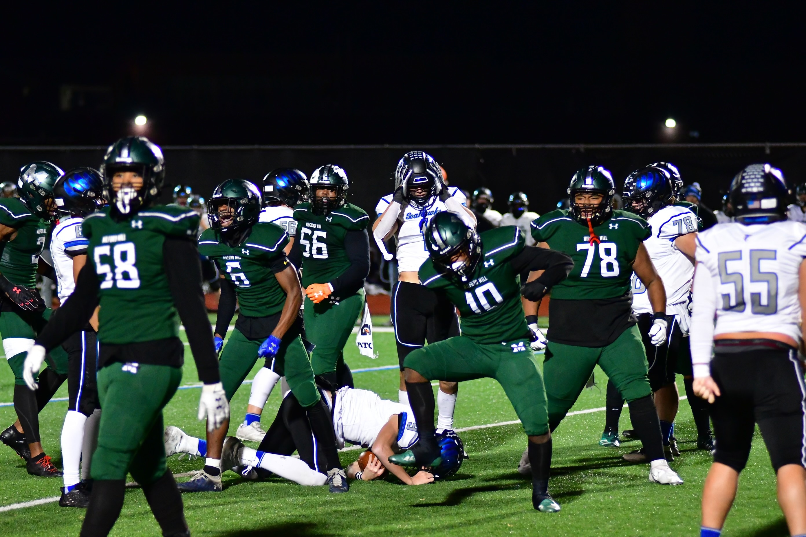Milford Mill's Malachi Barnes (10) celebrates after a defensive stop in the fourth quarter of Friday's Class 2A state football semifinal against Stephen Decatur. The No. 3 Millers came up a couple of defensive stands in the fourth quarter, rallying for a 40-33 victory to advance next Friday's state championship game at Navy-Marine Corps Memorial Stadium.