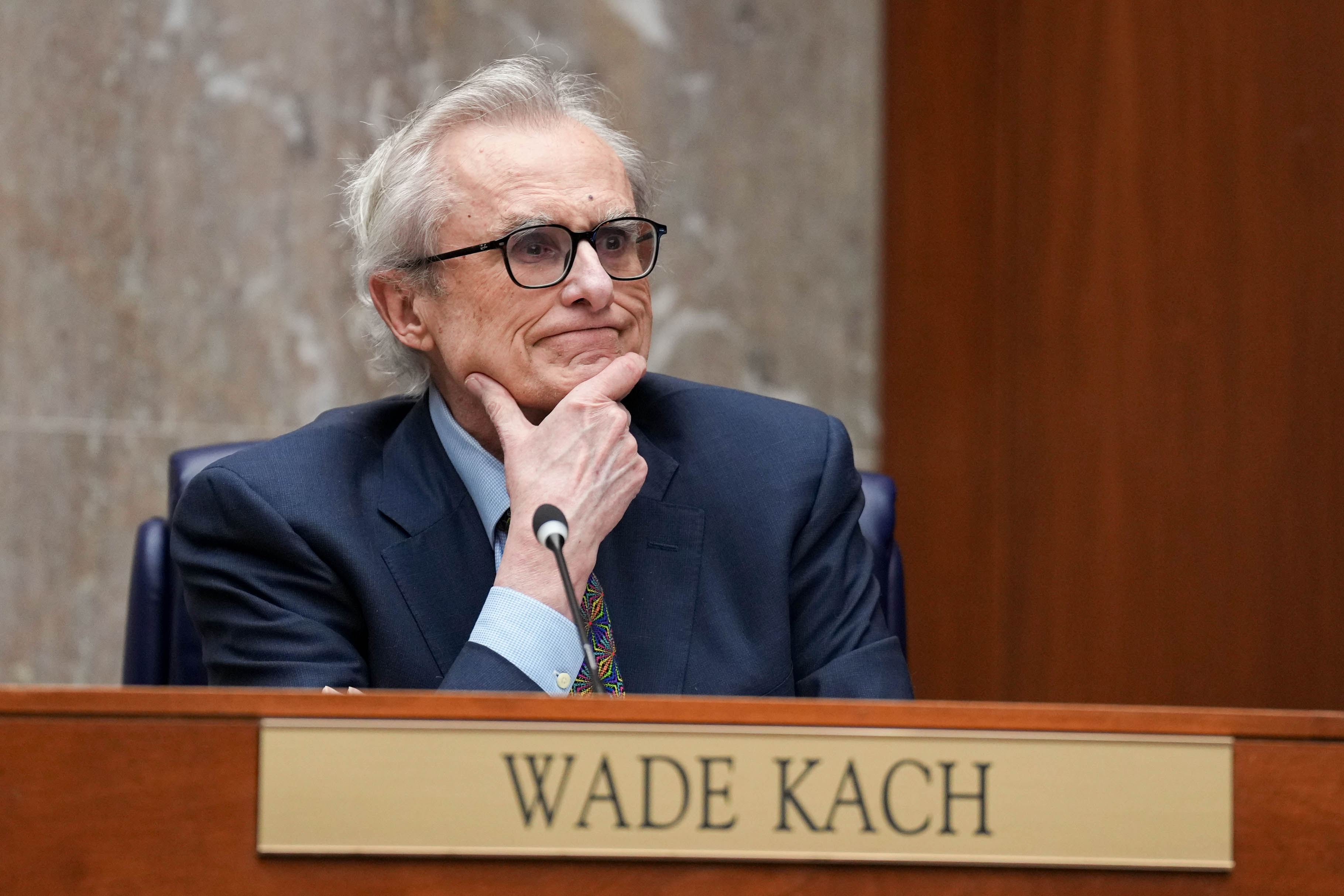 Baltimore County Councilman Wade Kach listens during a council meeting in Towson in 2025.