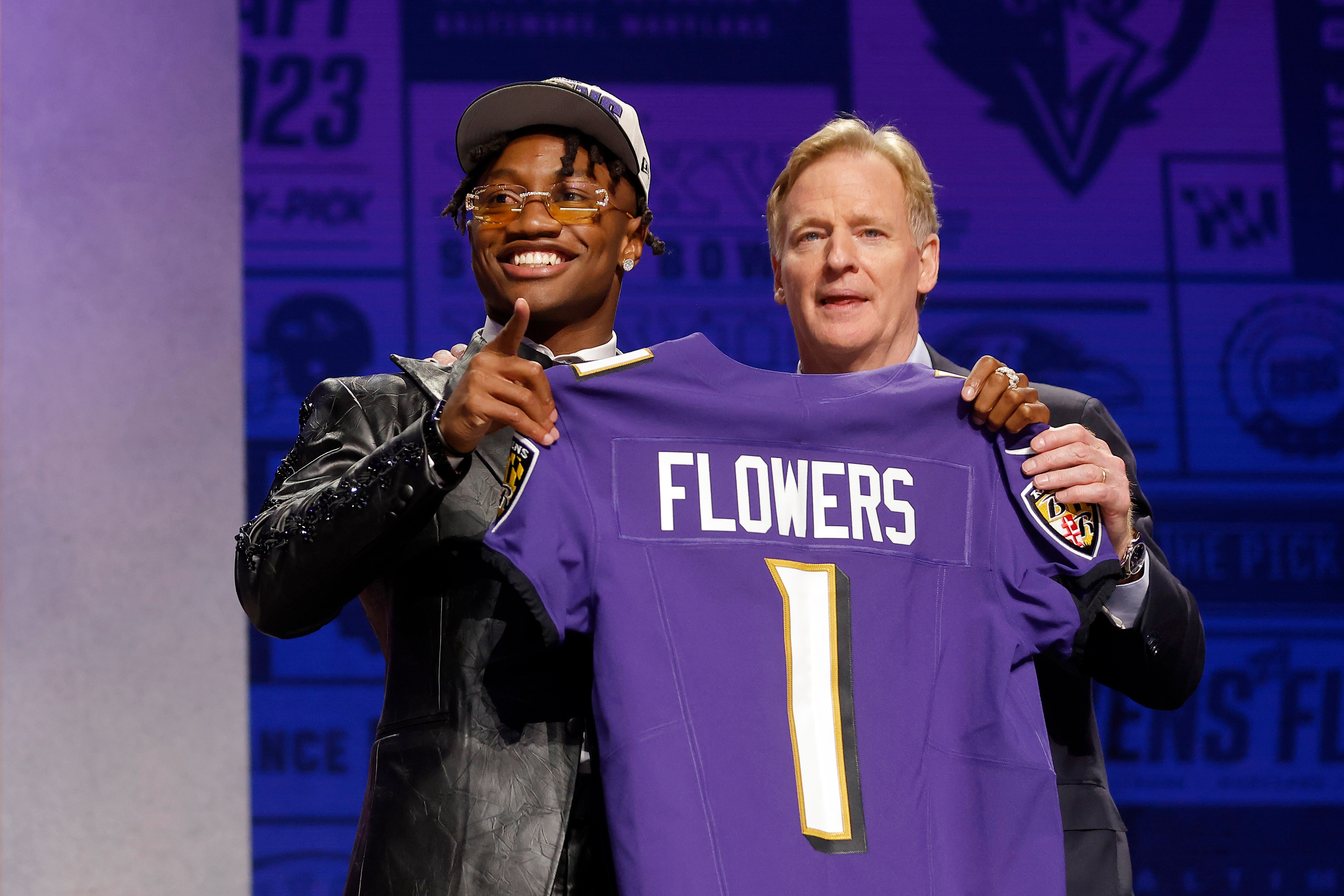 Zay Flowers poses with NFL Commissioner Roger Goodell after being selected 22nd overall by the Baltimore Ravens during the first round of the 2023 NFL Draft at Union Station on April 27, 2023 in Kansas City, Missouri.