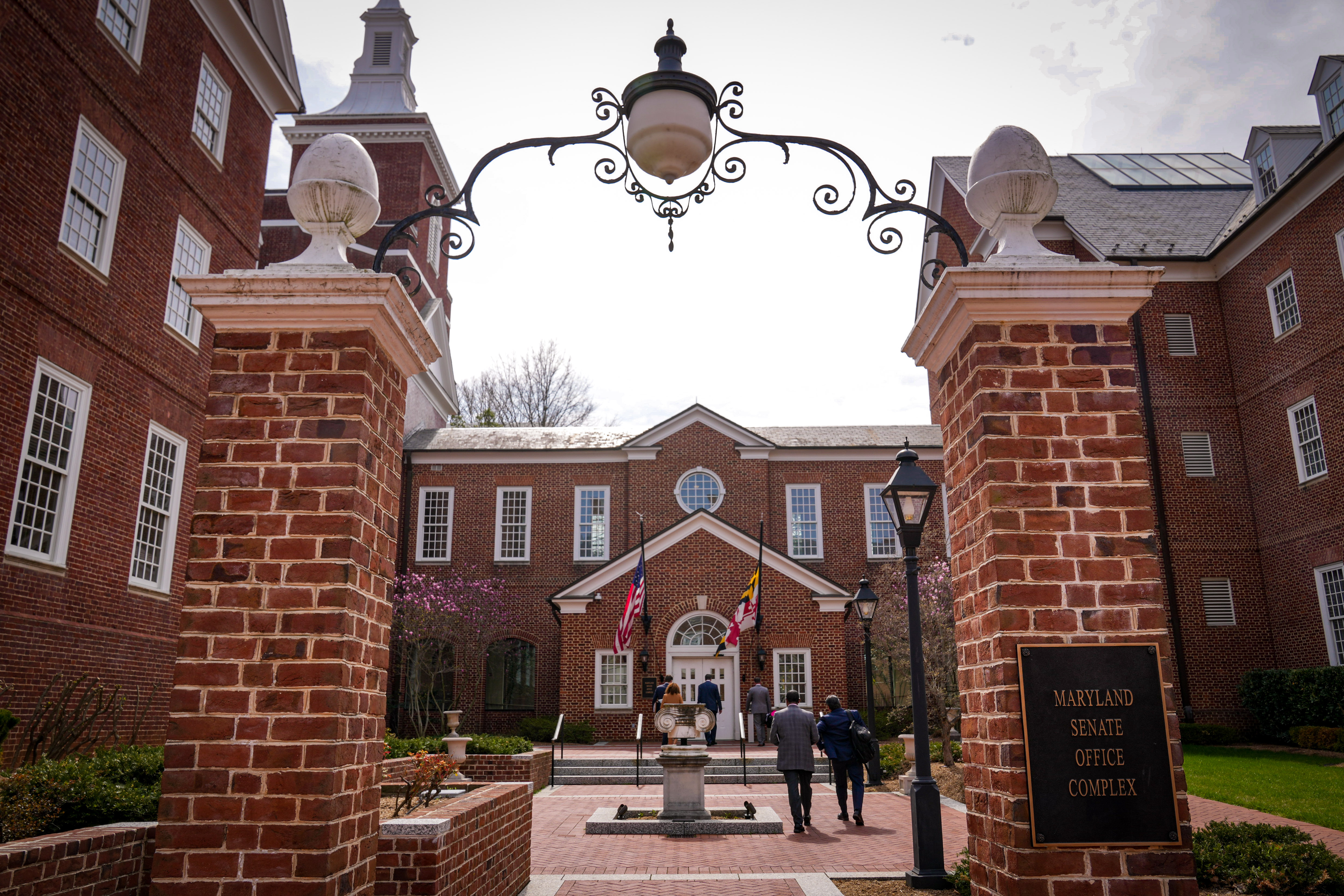 A former aide to Maryland state Sen. Will Smith has been charged with using Smith’s email to obtain a college scholarship.